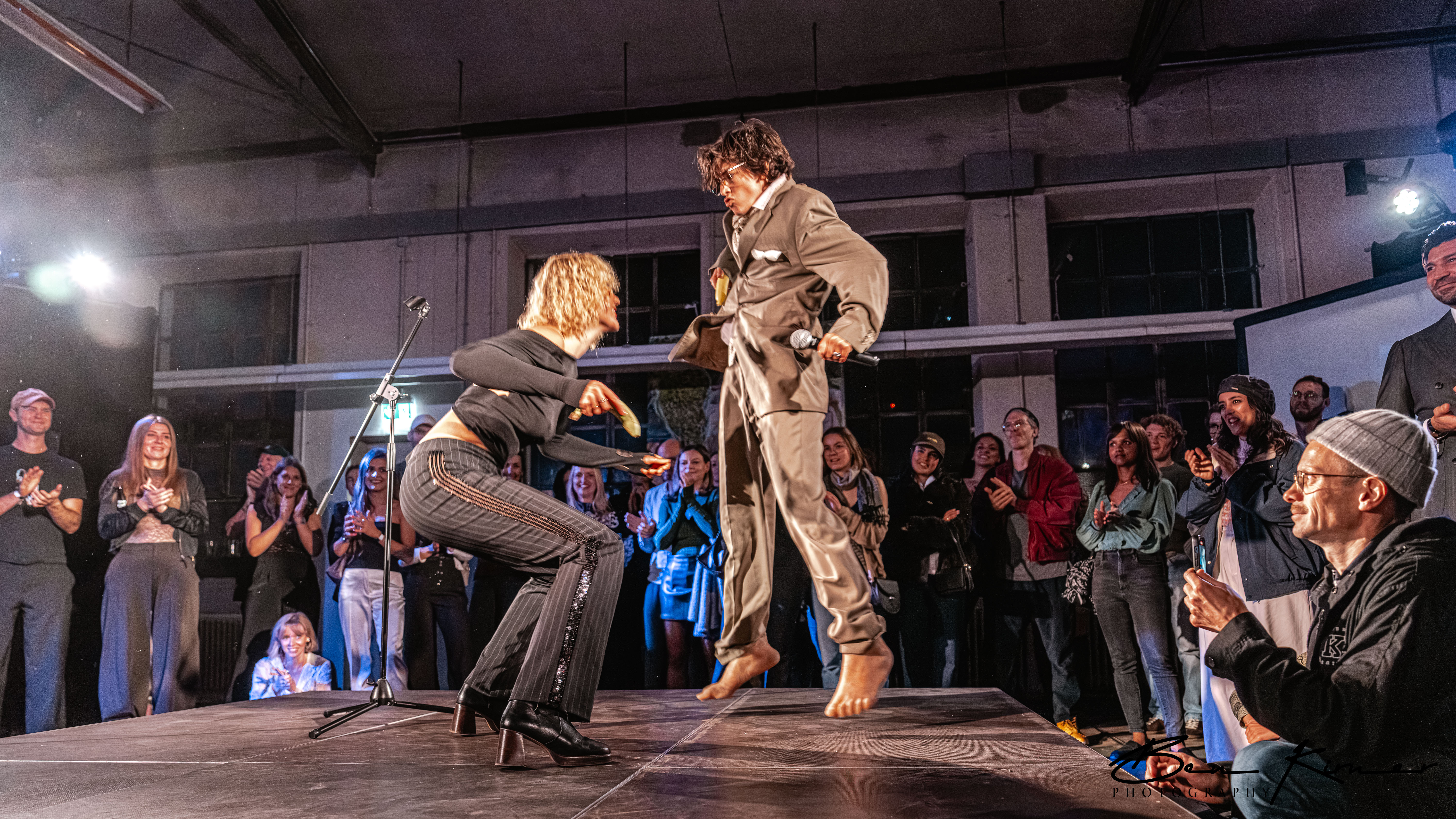 Entrepreneurs engaging in a lively discussion during a Bizz Buzz networking event.