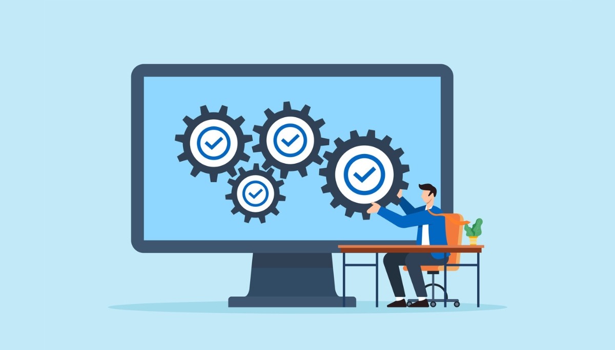 Illustration of a person interacting with gears on a computer screen, each marked with a check—symbolizing core engineering design principles like functionality, reliability, and system optimization.