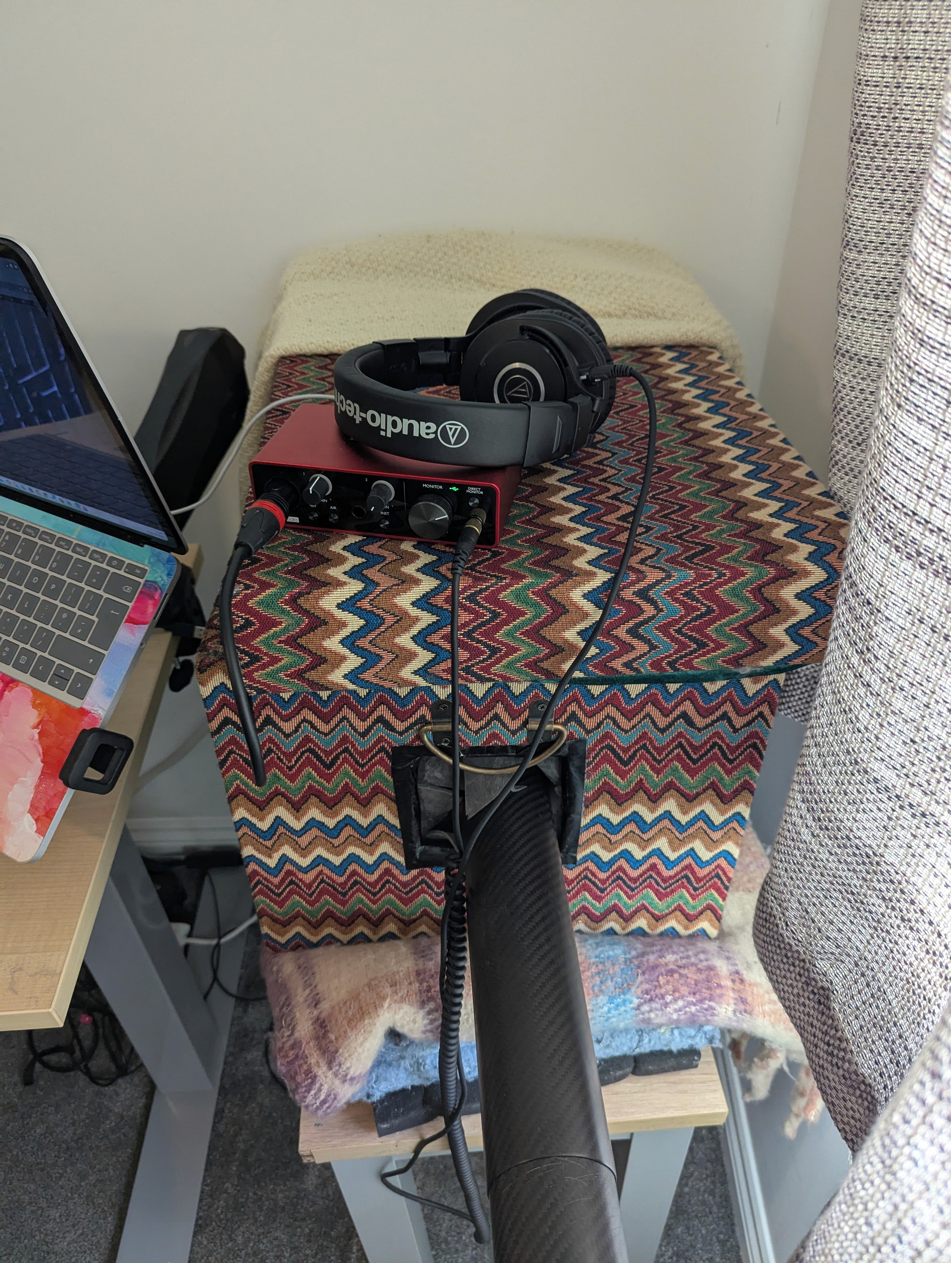 Focusrite Scarlett Solo and headphones.