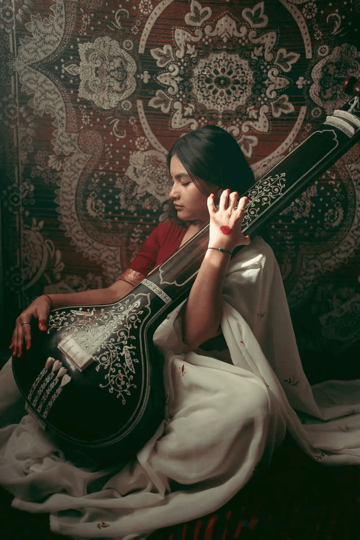Mithila artist with instrument