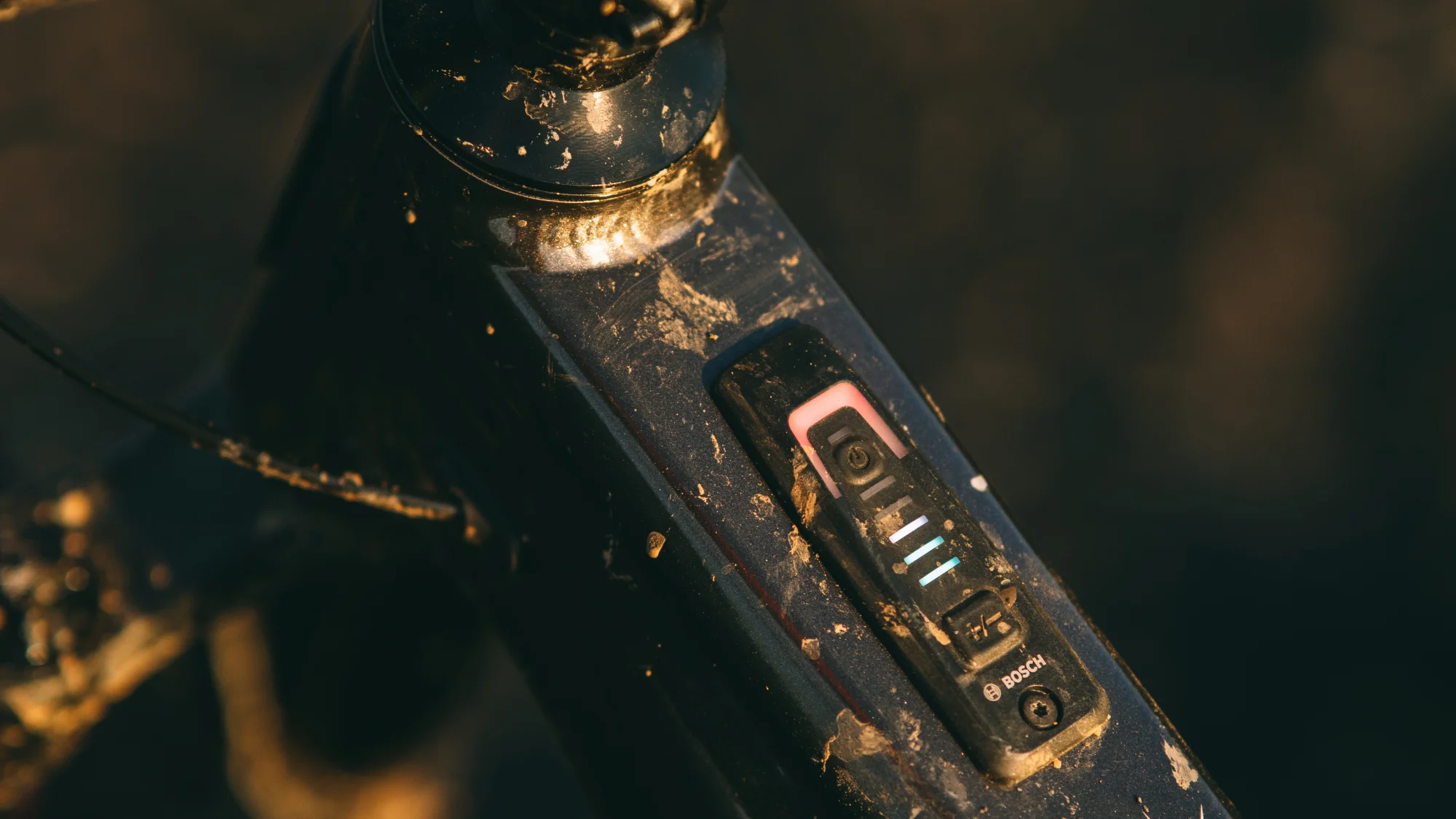 Integrated power and battery-status controls embedded within the Whyte Kado top tube.
