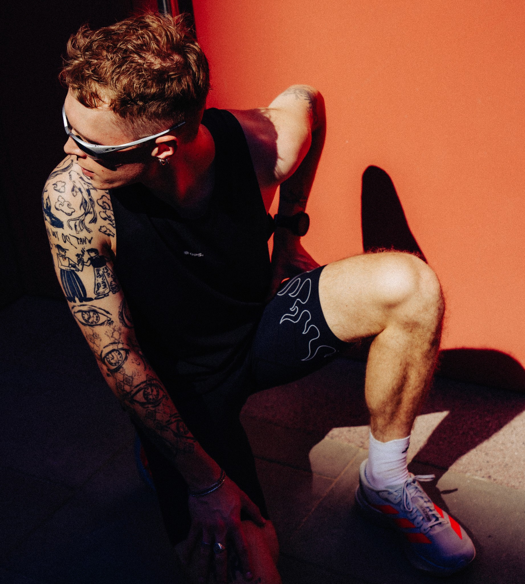 photo of a runner tired after running in the heat.