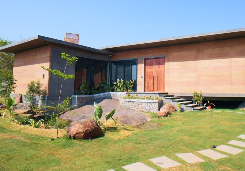 A flower-filled ring floats in fluffy clouds.
