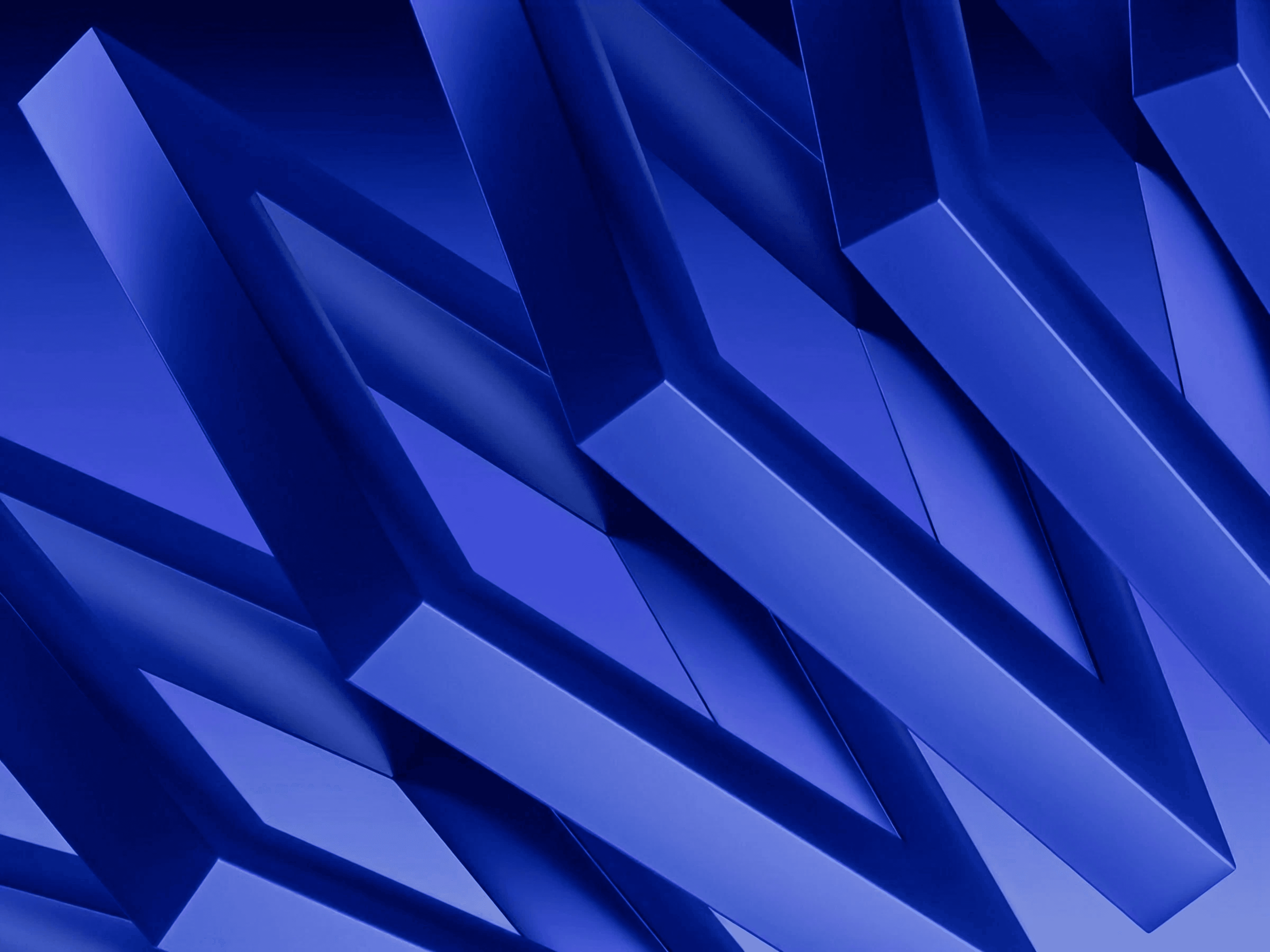 Abstract blue geometric shapes forming a pattern.