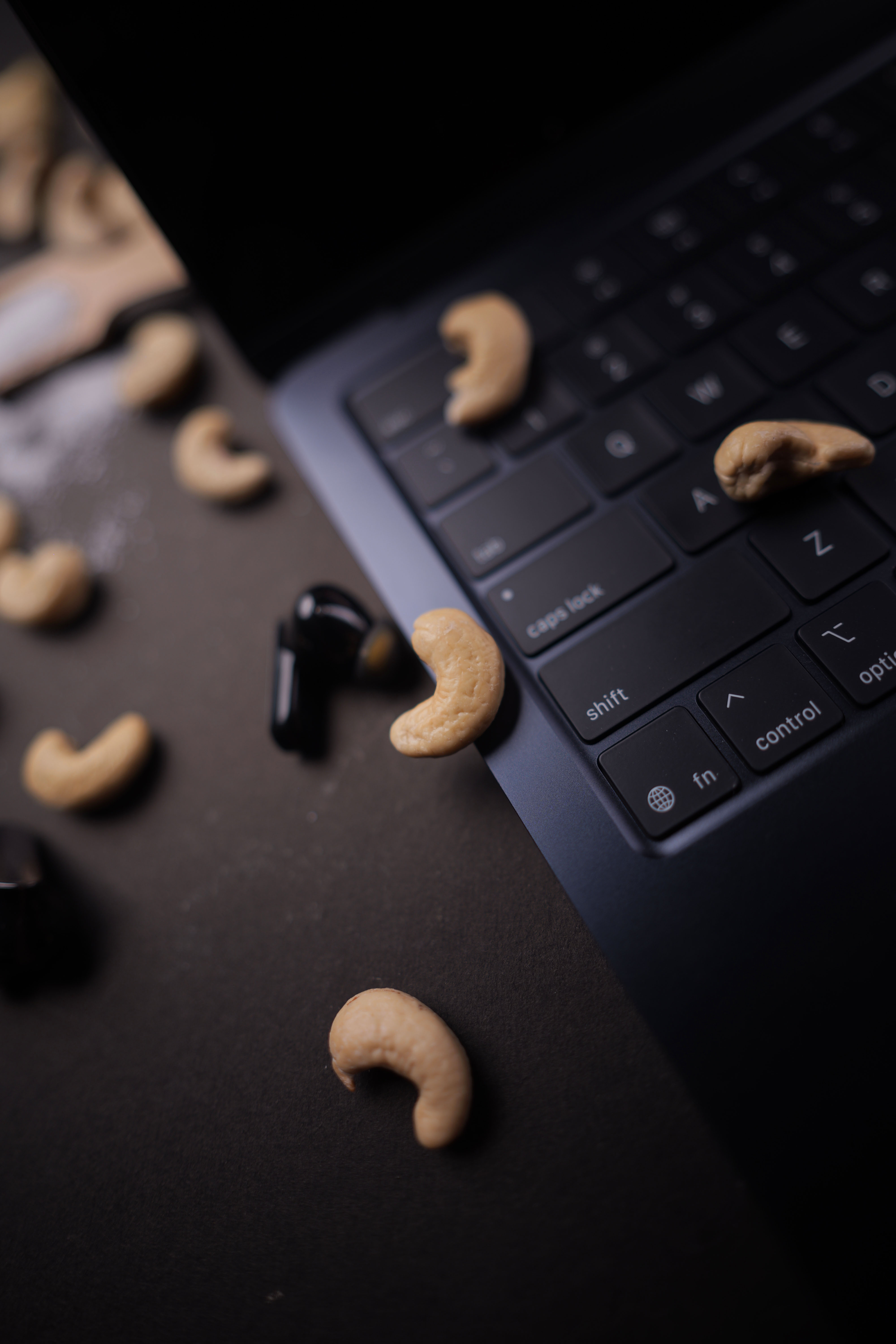 cashew nut lot on blue ceramic bowl