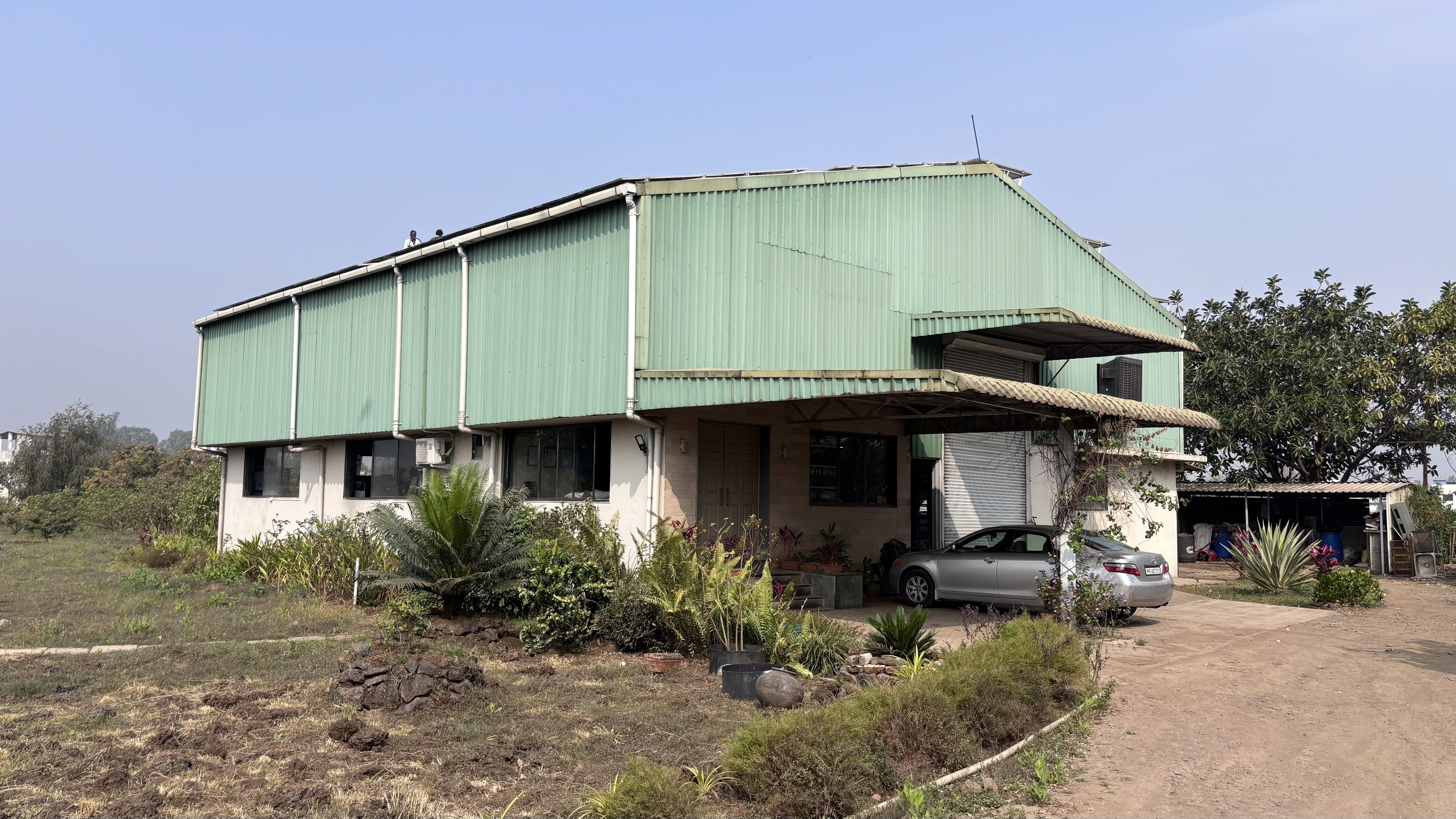 grayscale photo of man doing mechanical work