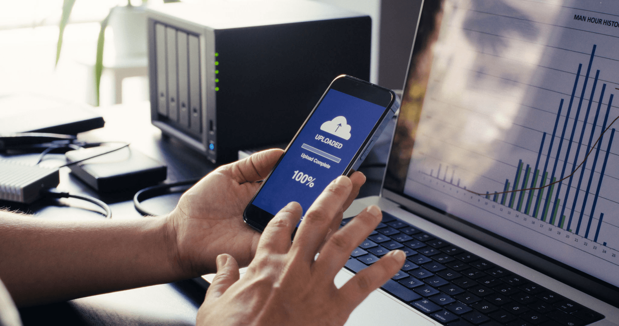 Smartphone completes file upload to cloud - Best Cloud-Based Document Generation Platforms