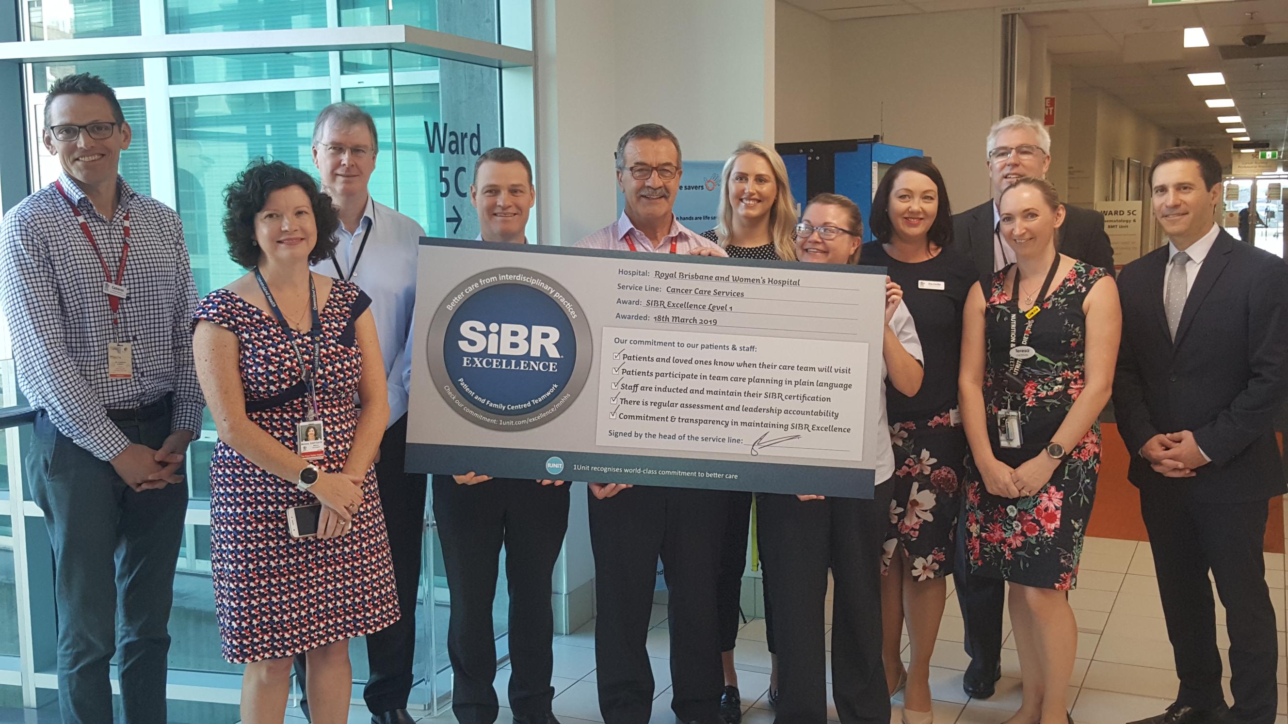 1Unit team with hospital oncology staff