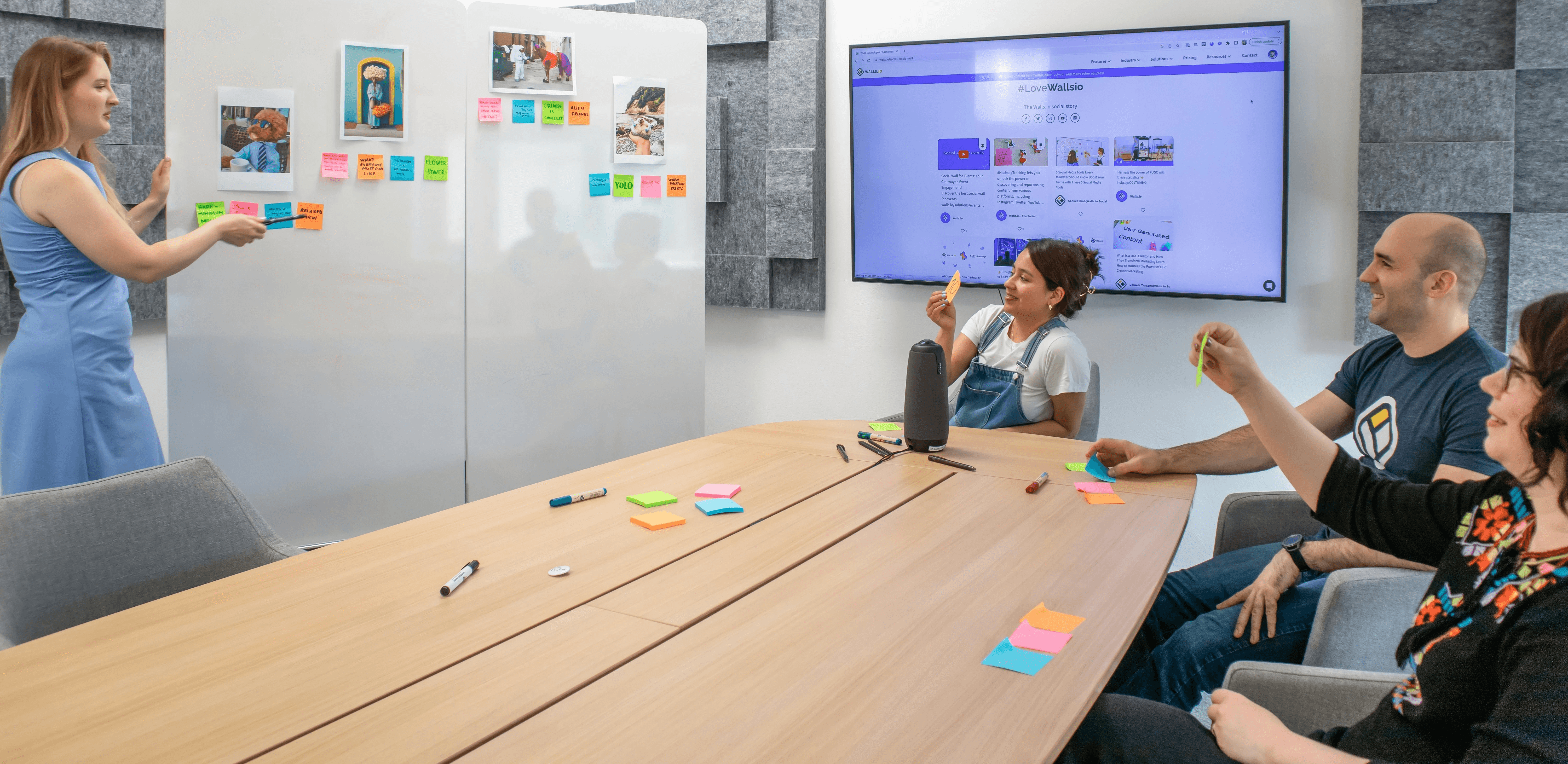 a group of people sitting around a conference table