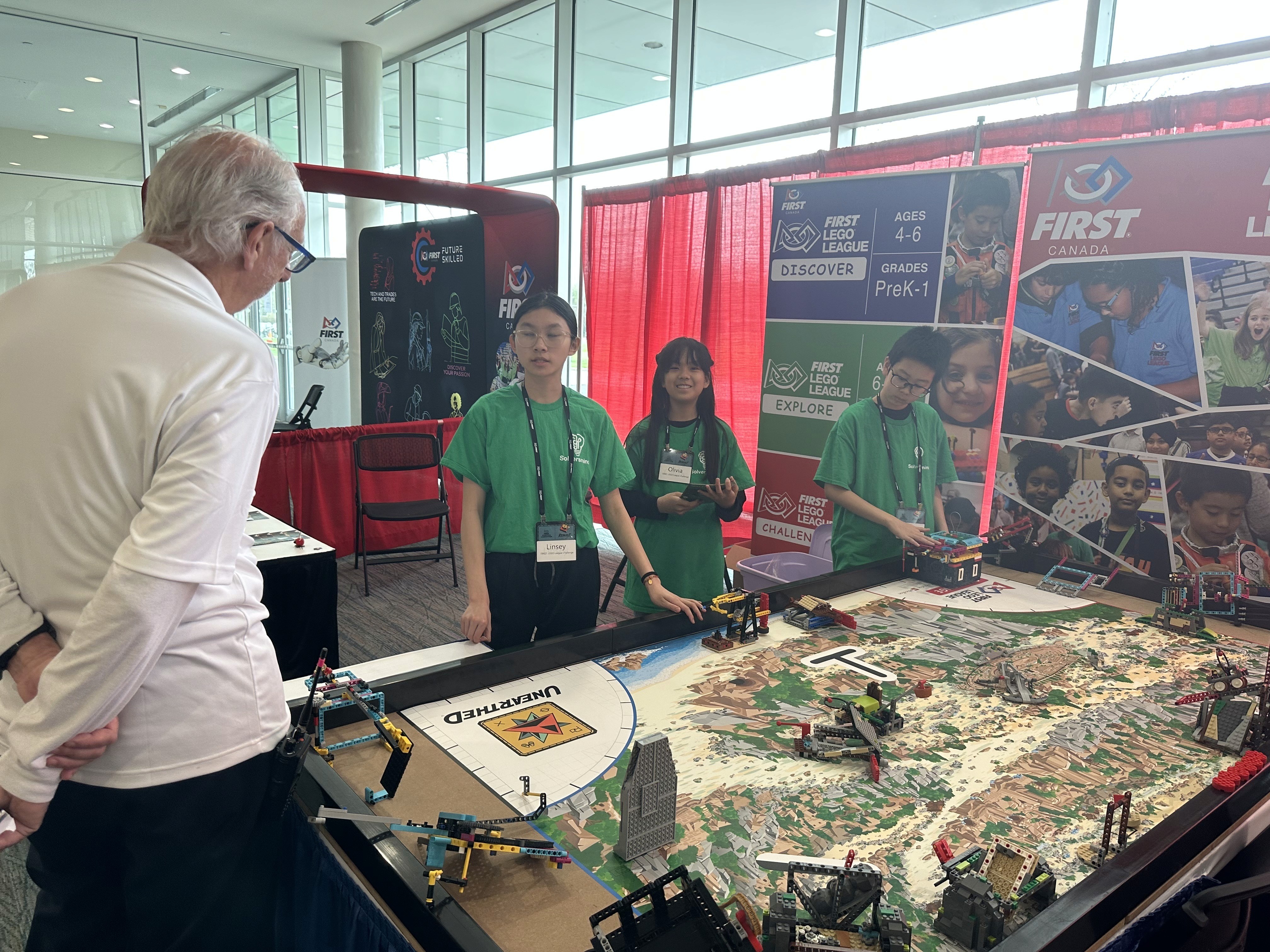 Chrono Solvers explaining advanced mechanical design and Python programming at the FIRST Ontario Provincial Championship