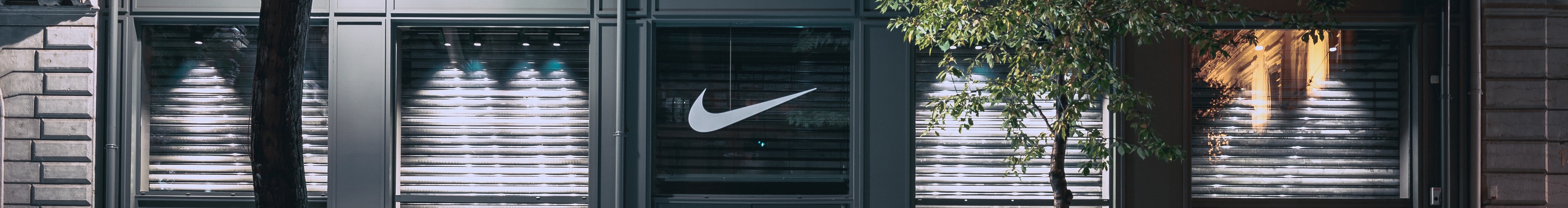 Nike Logo on A Storefront Door