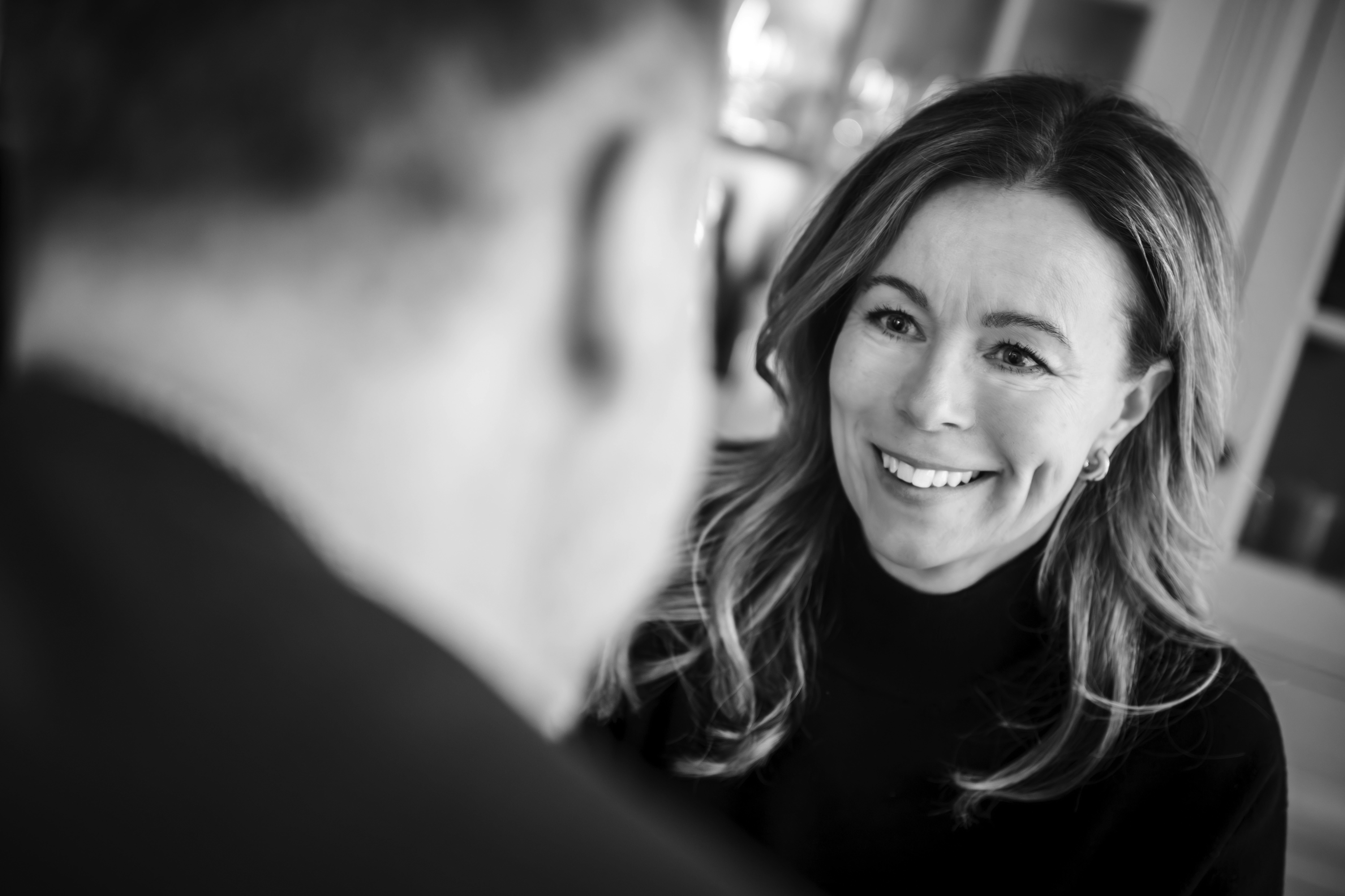 a man in a yellow shirt is on a red track