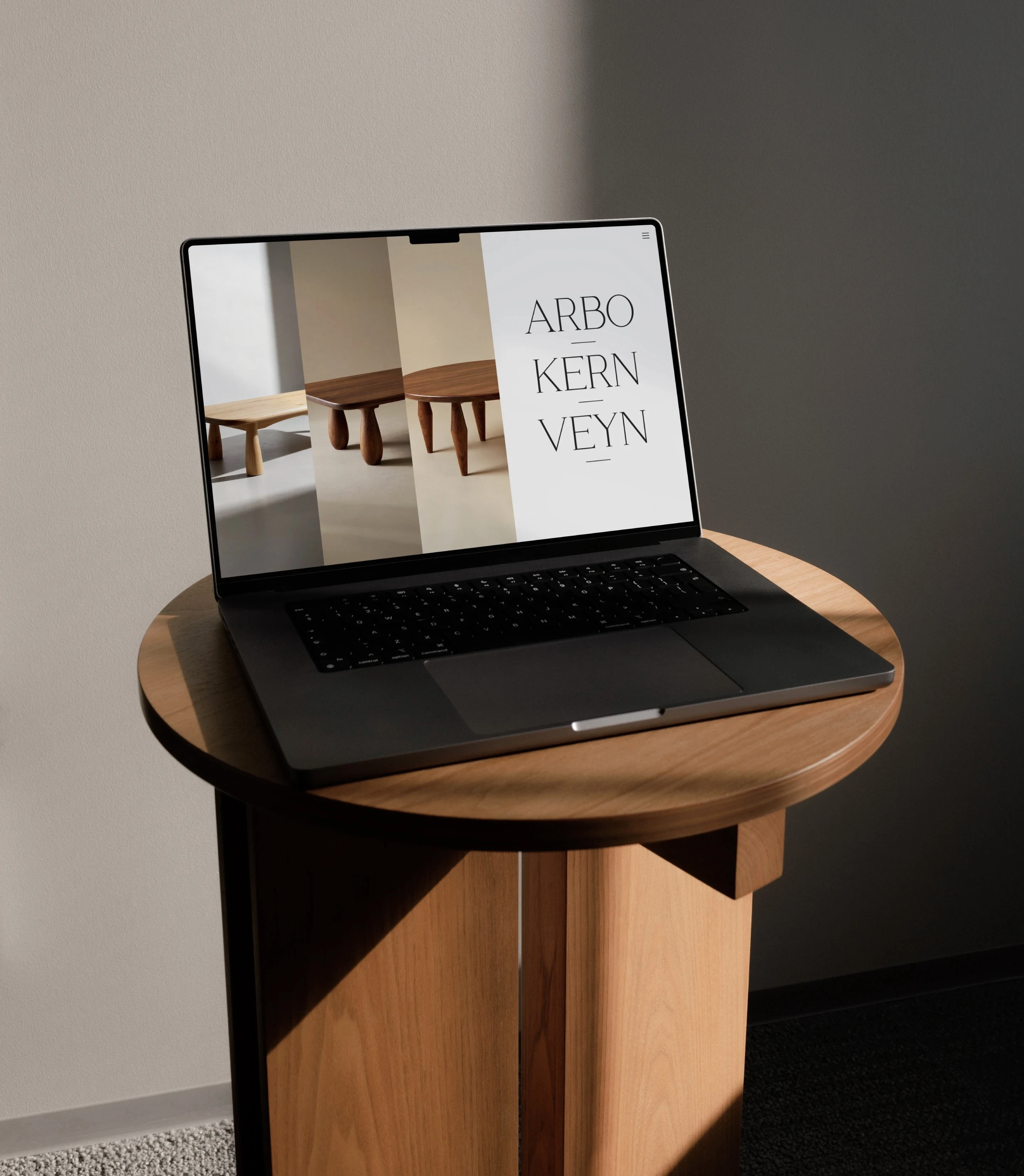The website presented in a MacBook mockup.