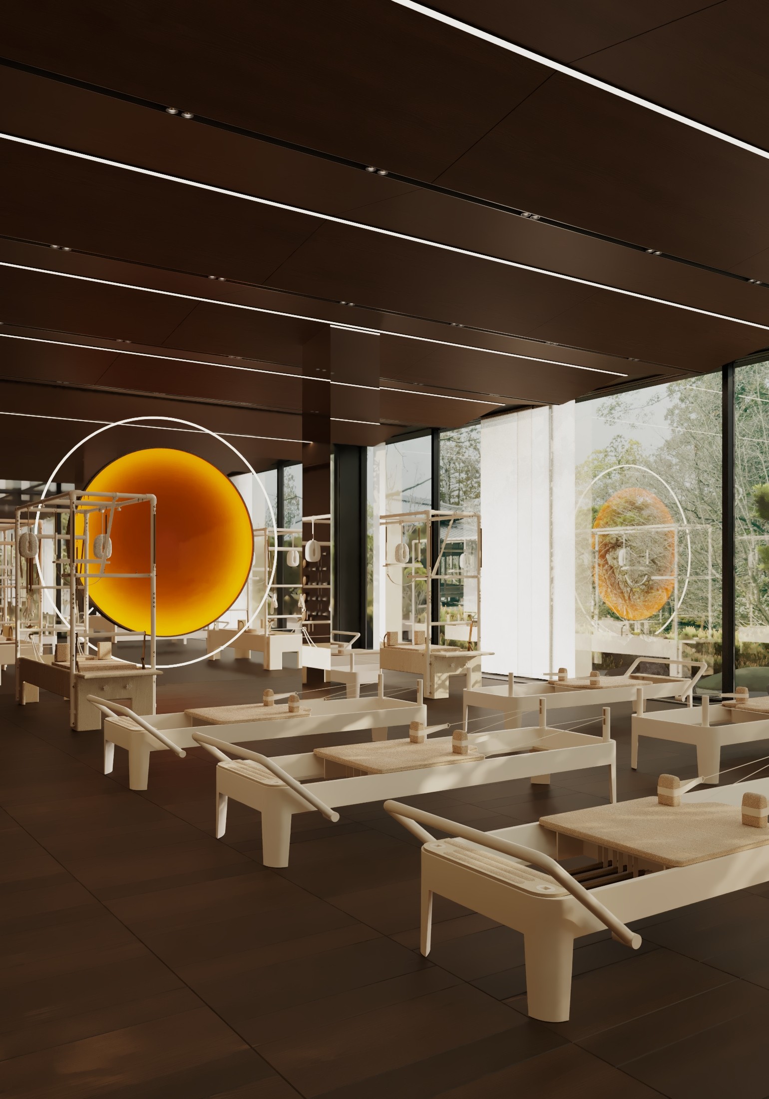 Modern pilates studio with reformers and large window views