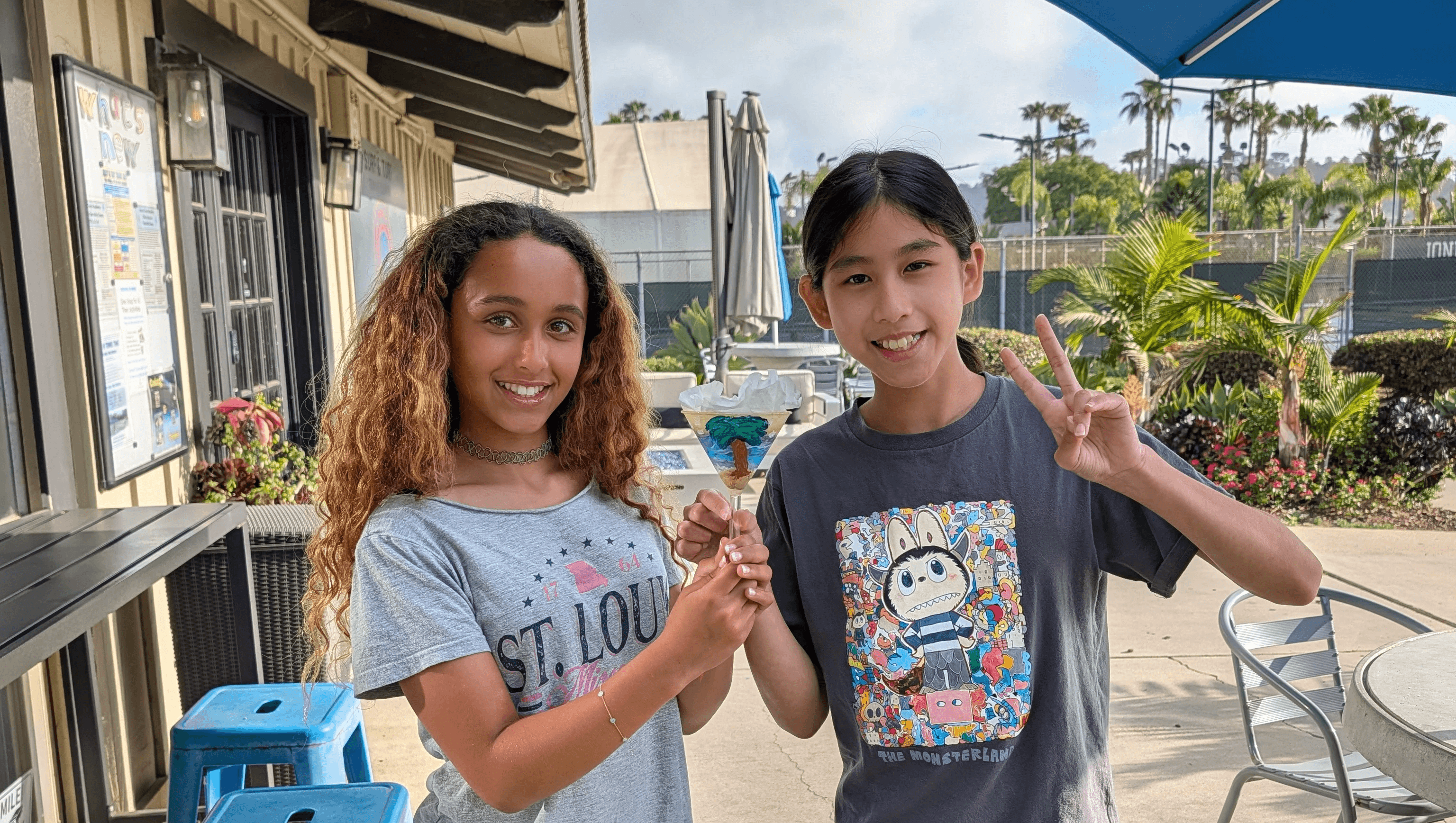 Esme and Ella holding their nature-inspired water filter
