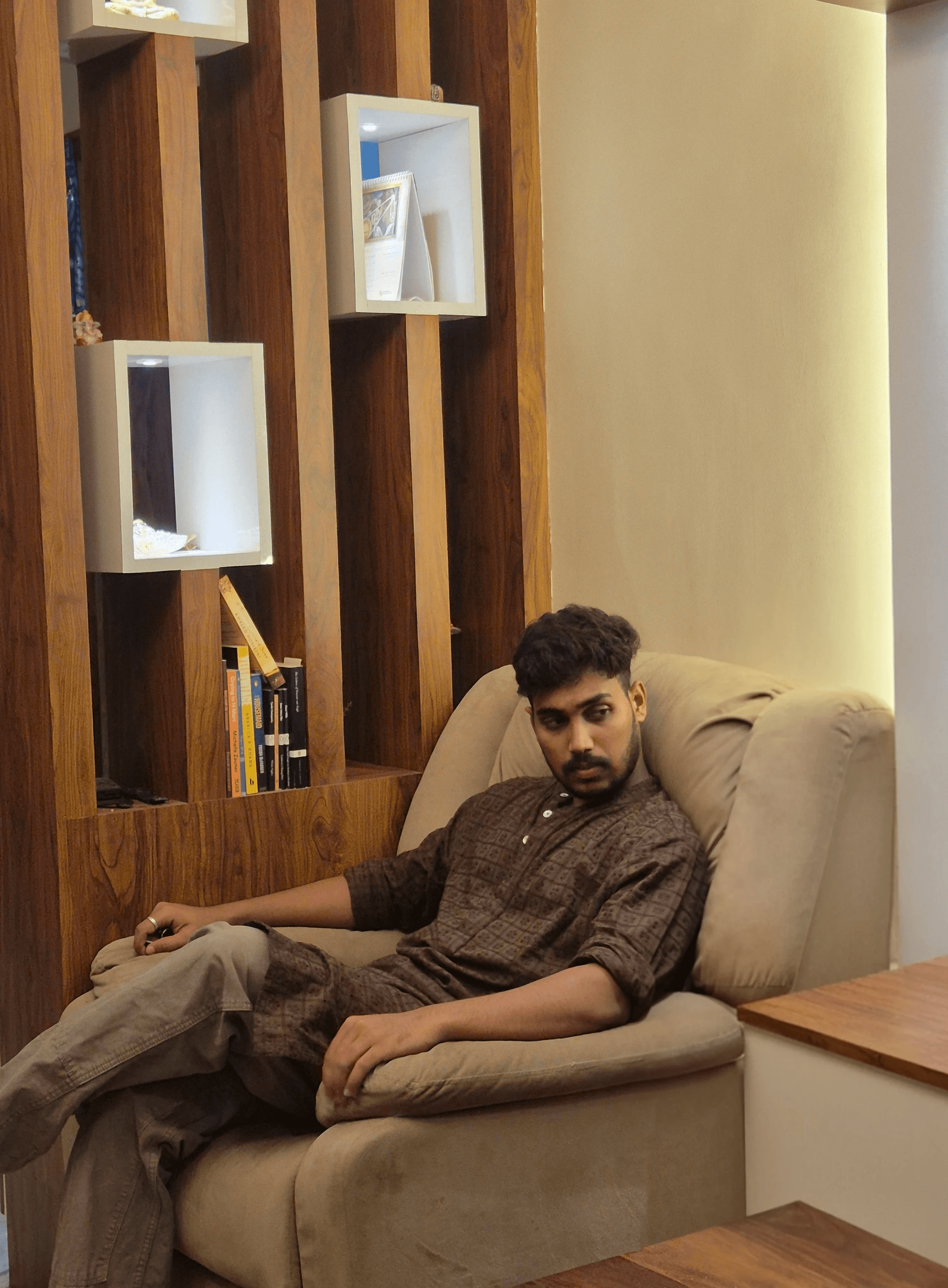 A boy in shorts and cap on his hat