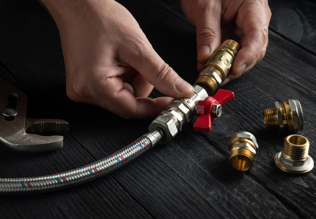 An engineer conducting a boiler installation service