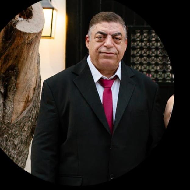 Professional portrait of Eng. Khaled Abdel Baky, Director of COMFORT360 – Expert in real estate valuation, machinery appraisal, and international standards (IVS, RICS, FRA)