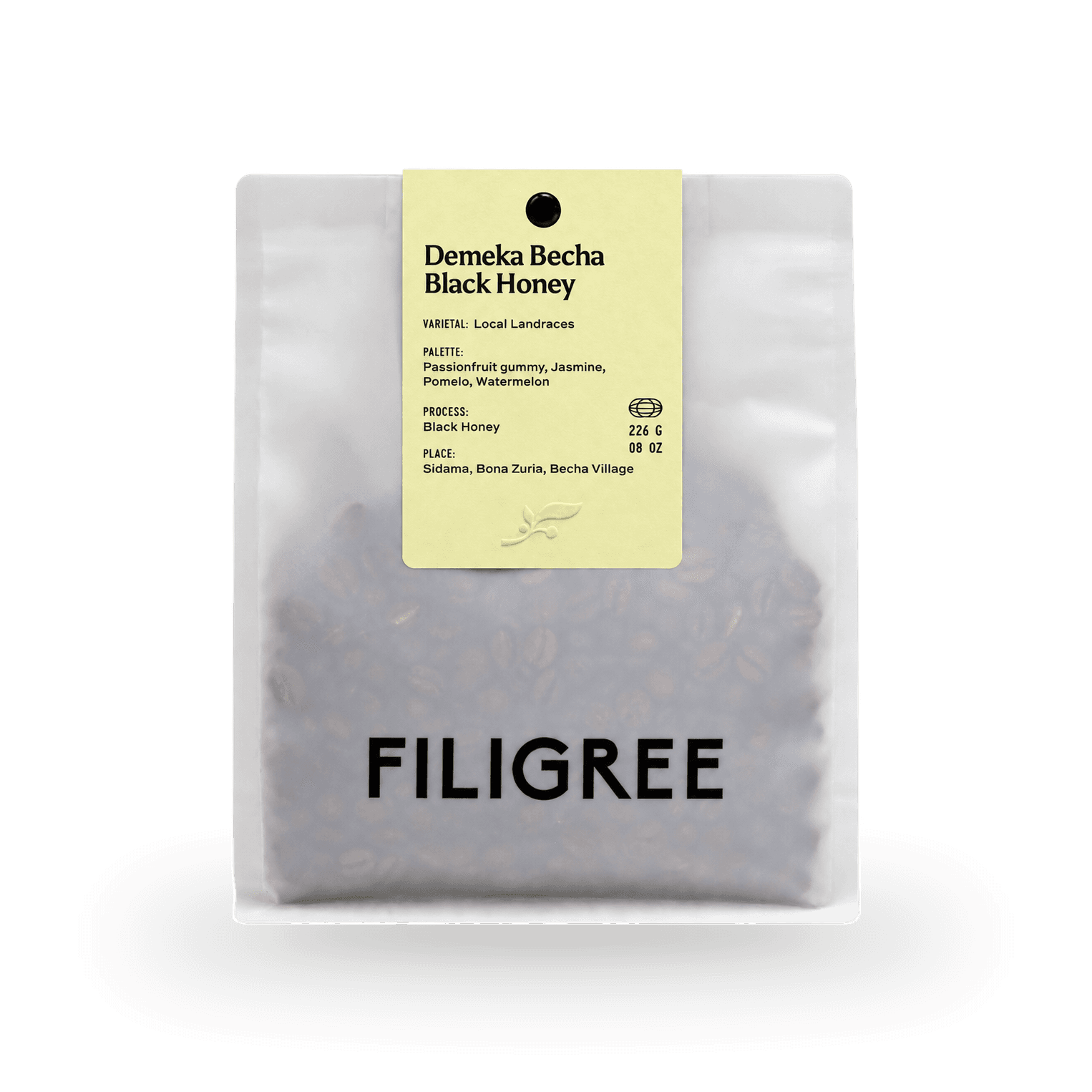 Filigree Demeka Becha Black Honey coffee bag with yellow label and soft shadow