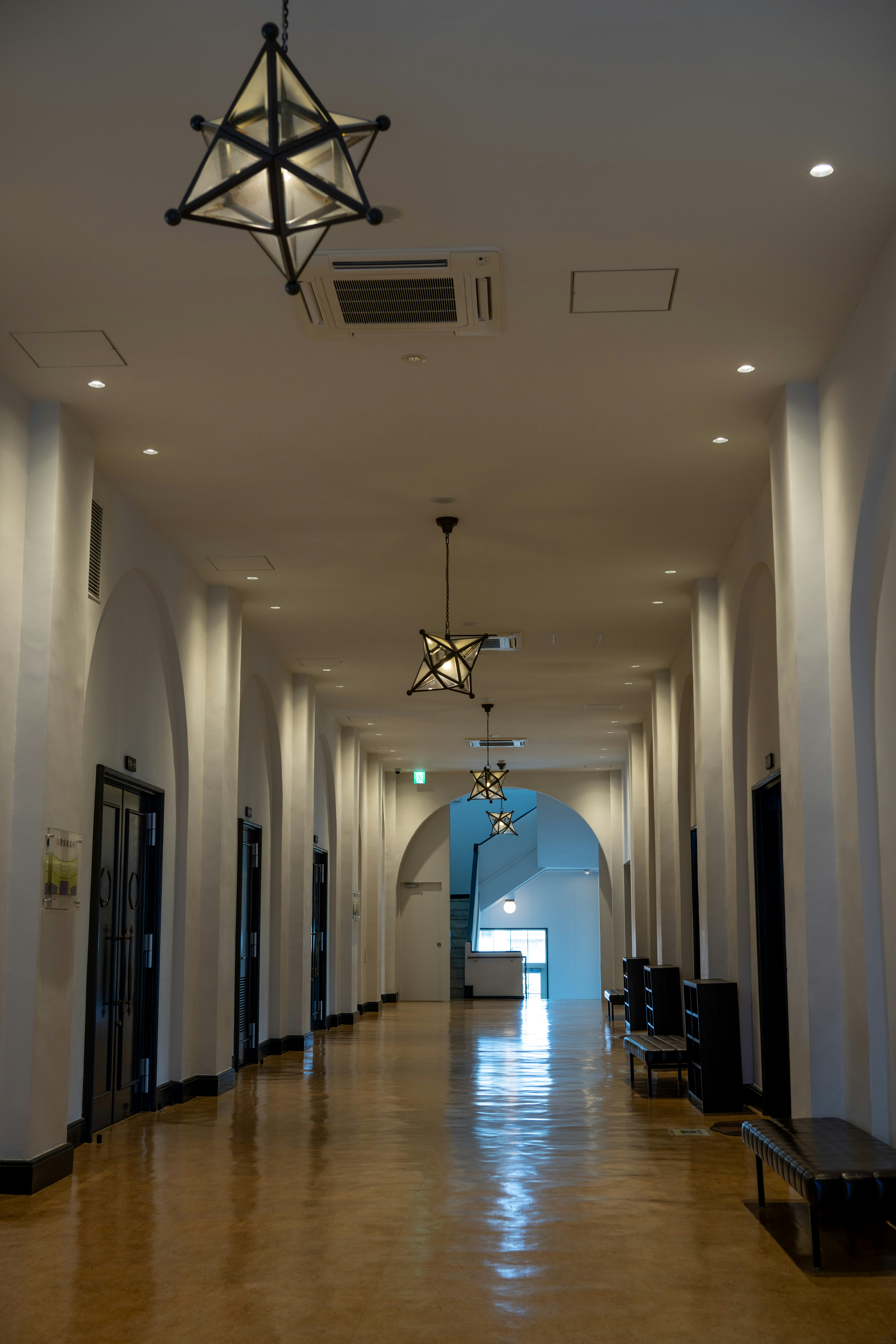 a long hallway with a star hanging from the ceiling