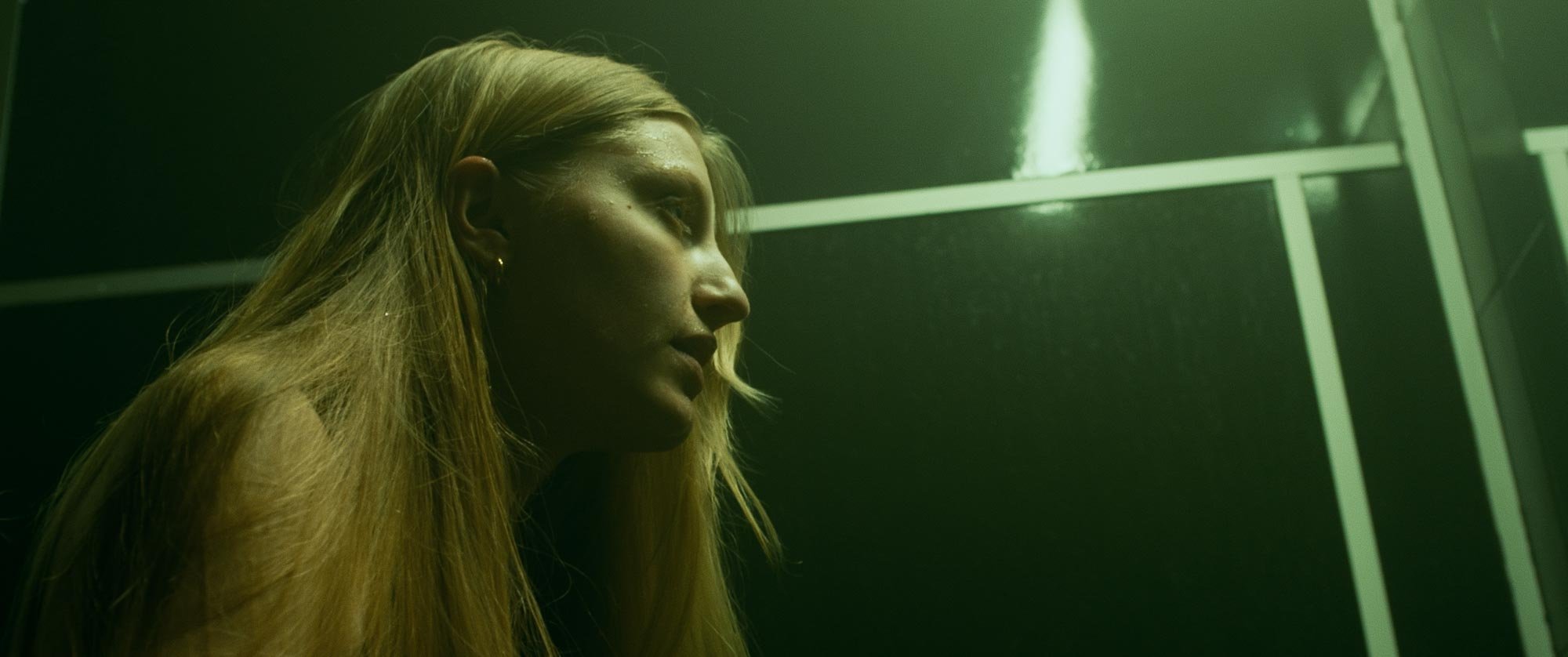 Streetside billboard with flyposters of the Batch.Works brand and illustrations