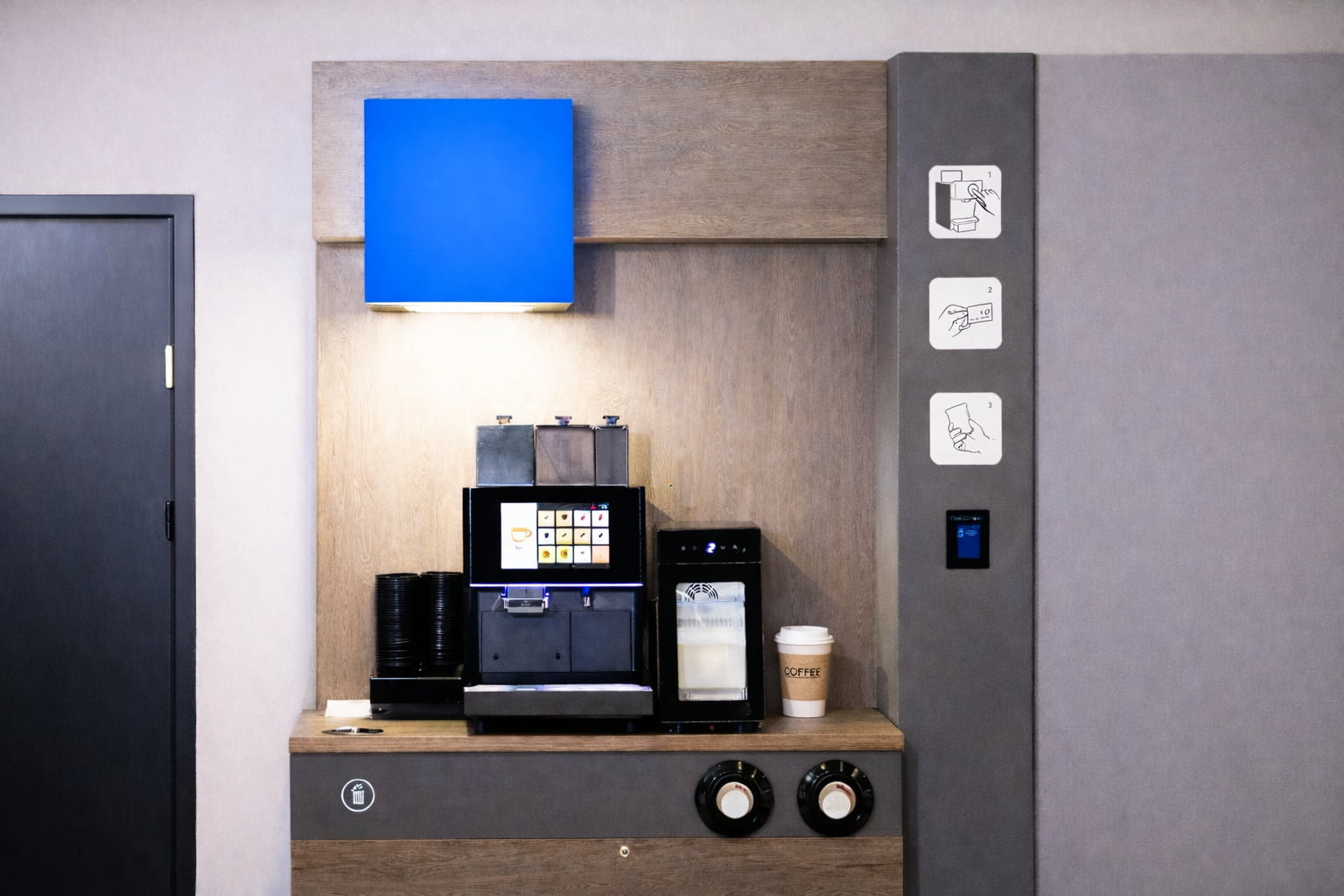 automated cafe franchise robotic coffee machine serving drinks in a smart vending kiosk