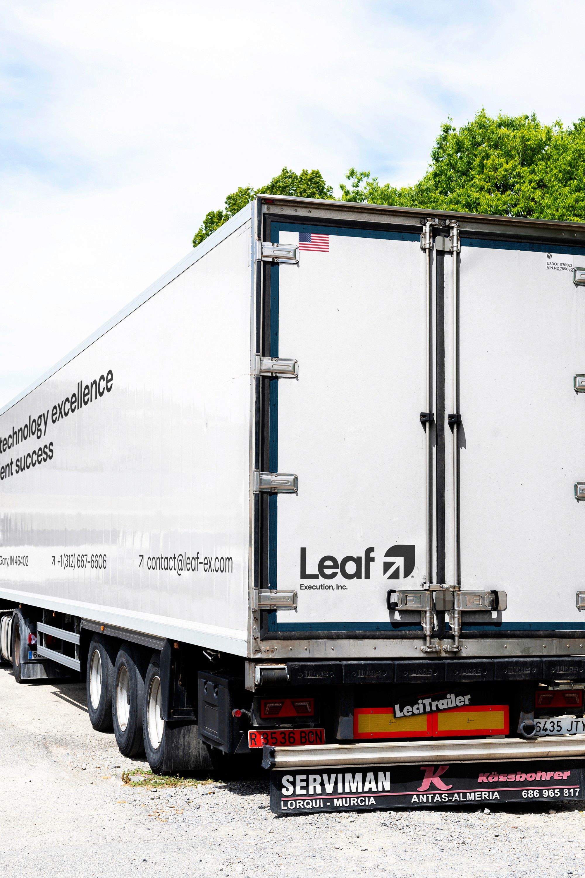 Streetside billboard with flyposters of the Batch.Works brand and illustrations