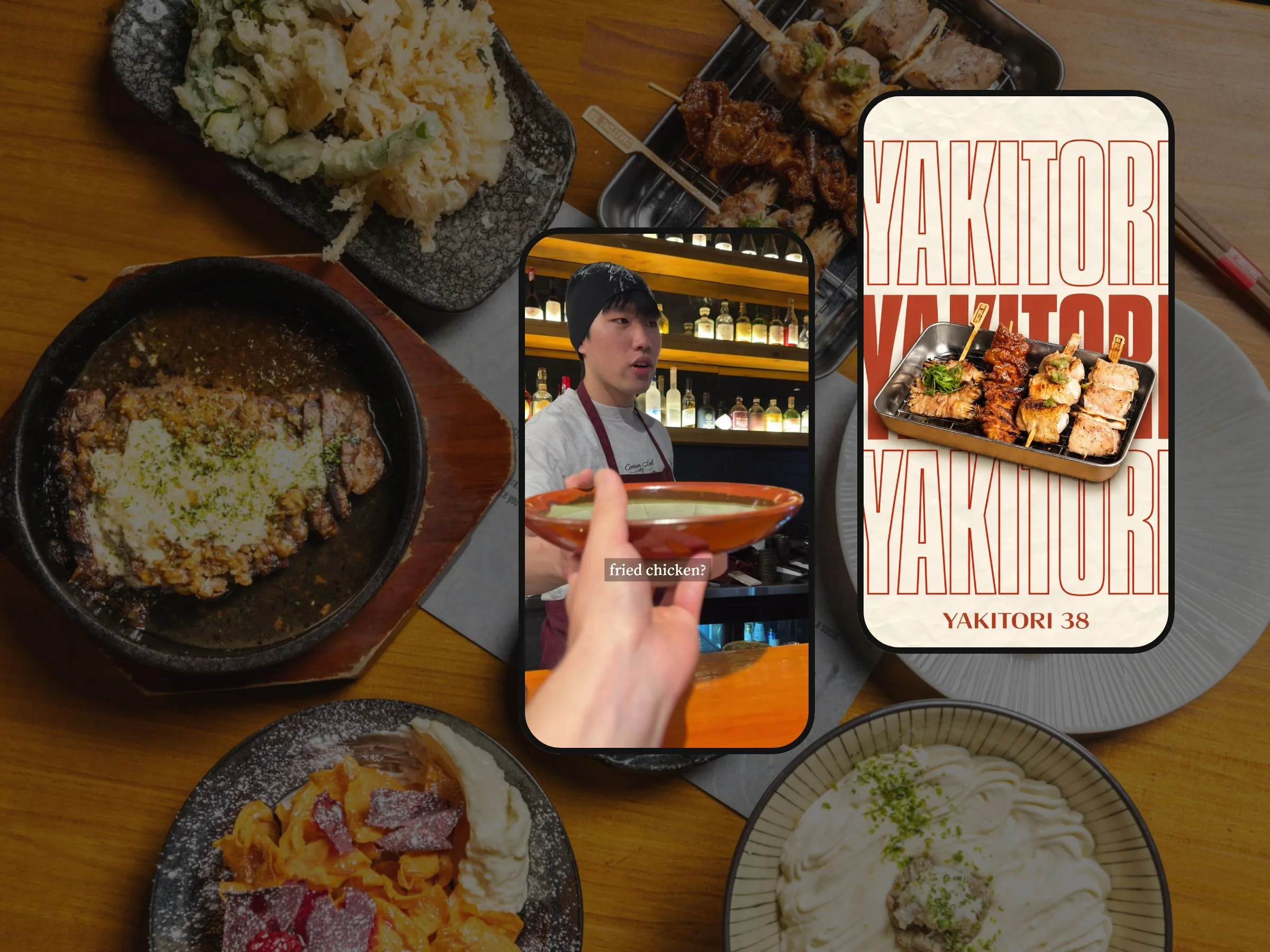 Yakitori 38 reel and poster on phone screens over a table of Japanese dishes