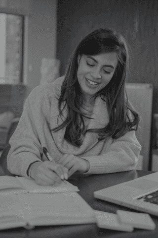 man standing in front of group of men