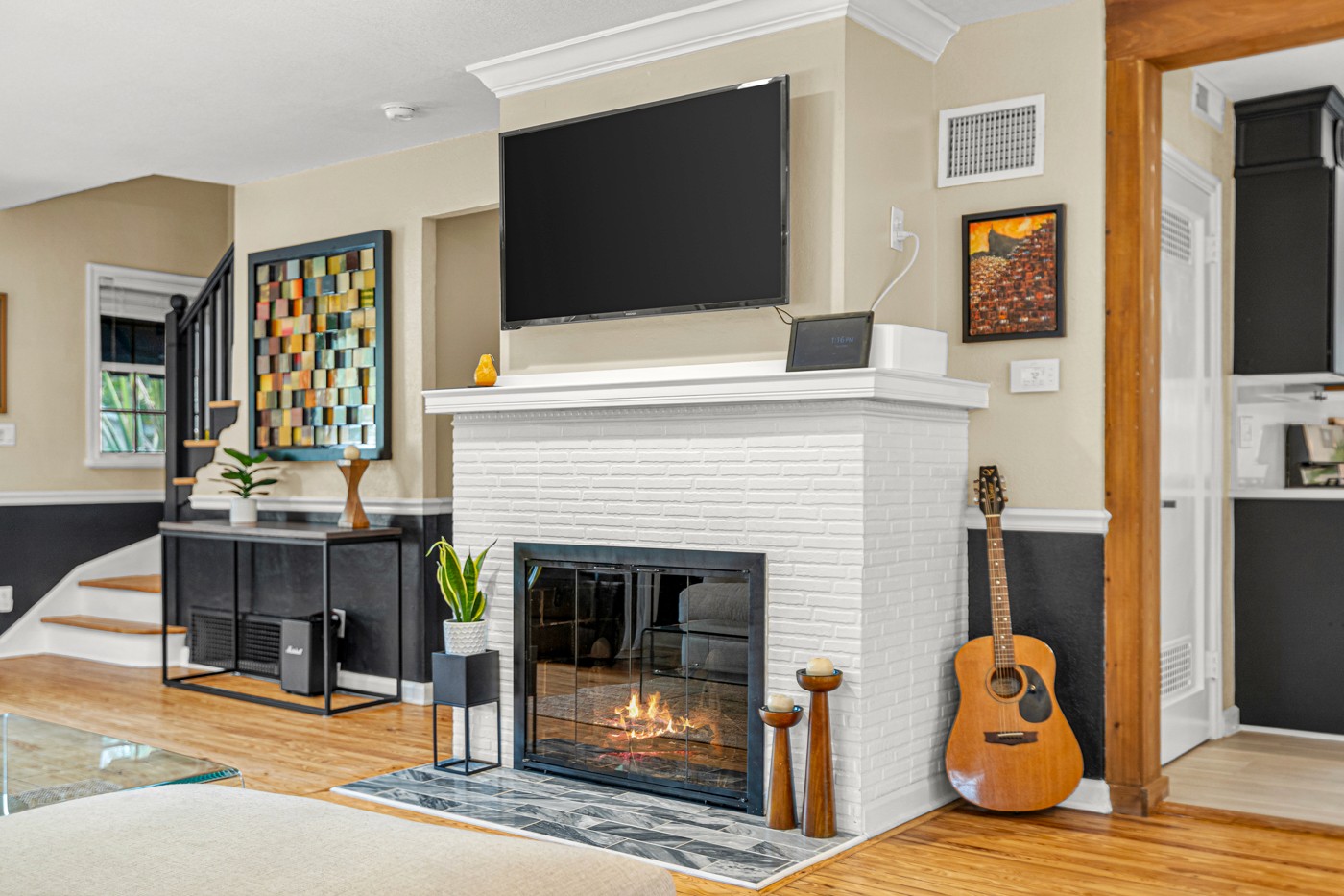 White brick fireplace and architectural details in the living room of a classic St. Petersburg home photographed by Gator Gaze Media