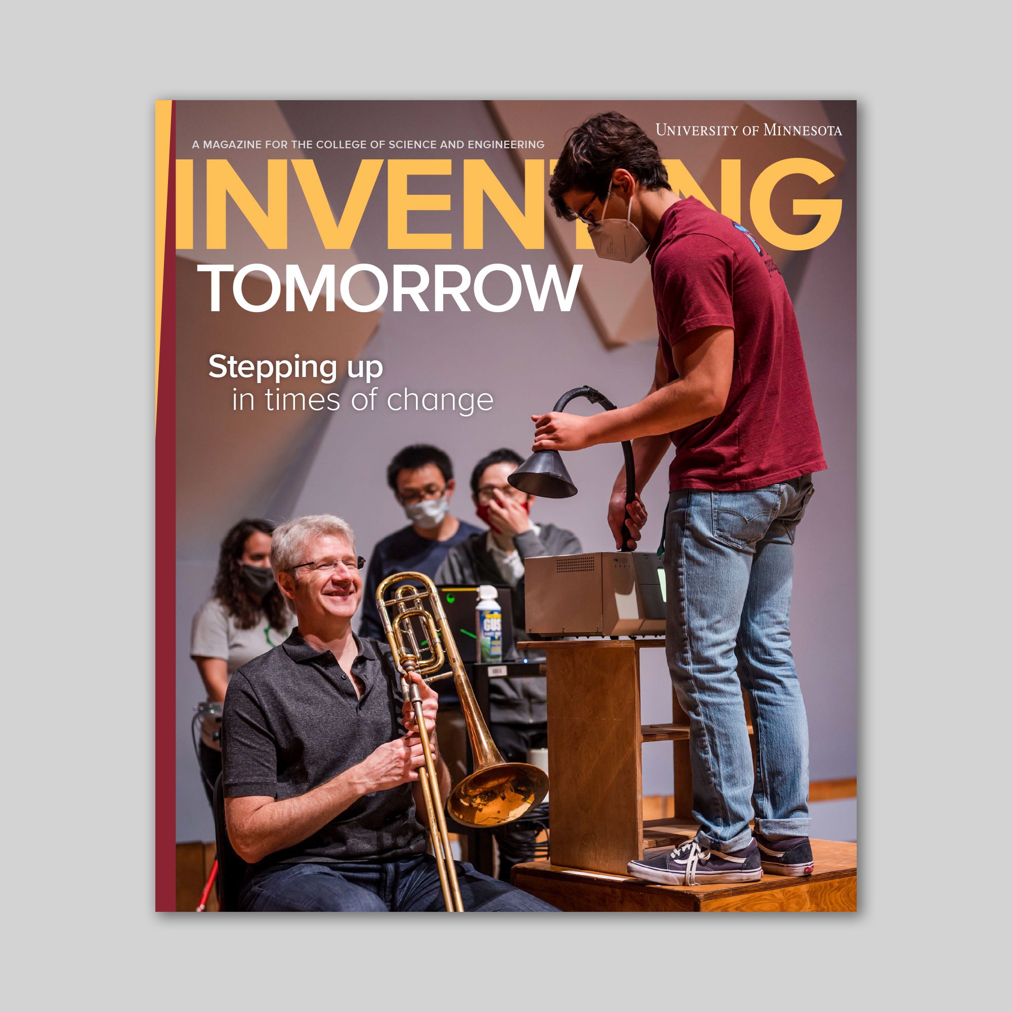 Magazine with people on a stage with a trombone on the cover