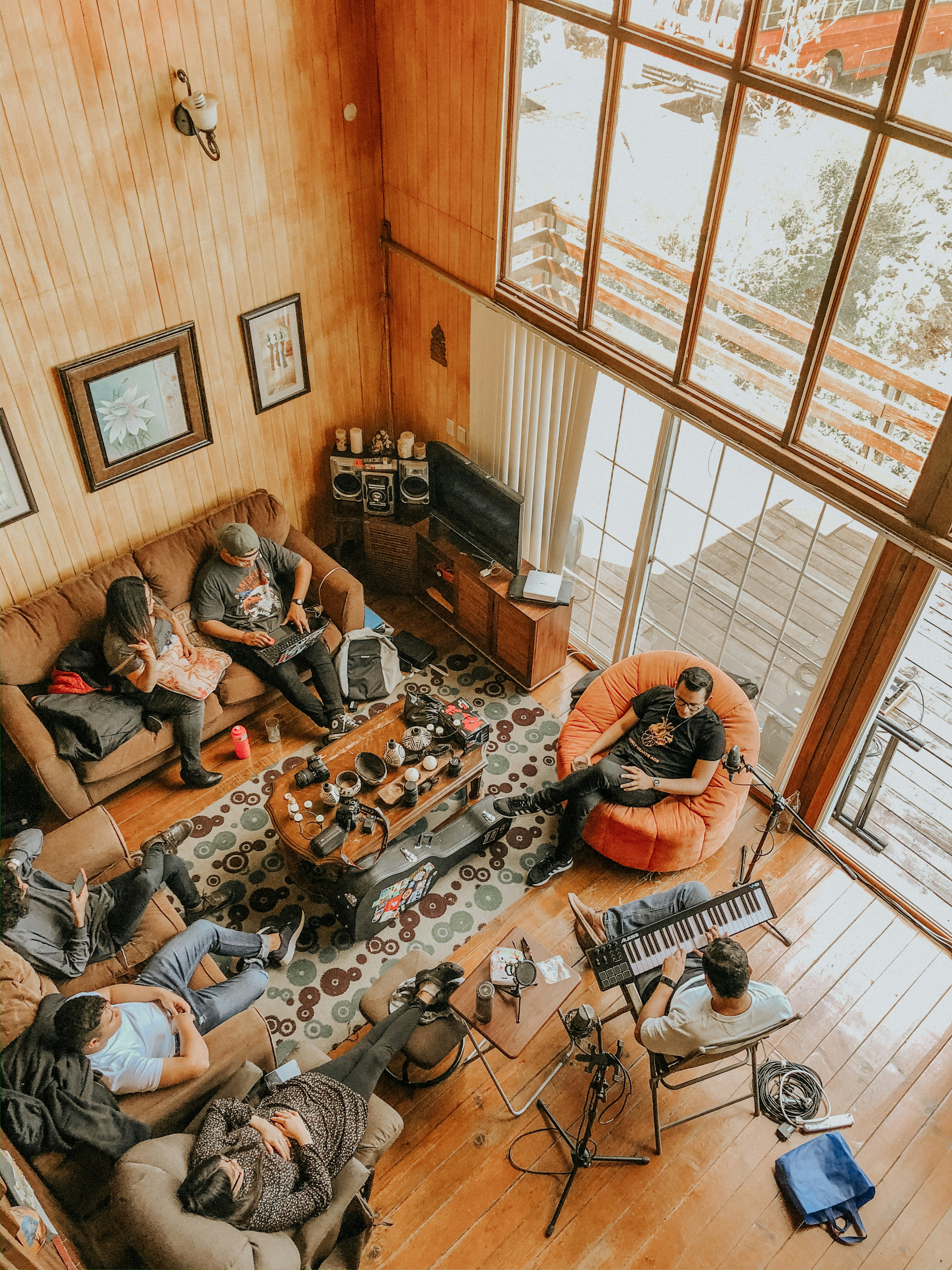 people sitting on floor inside room