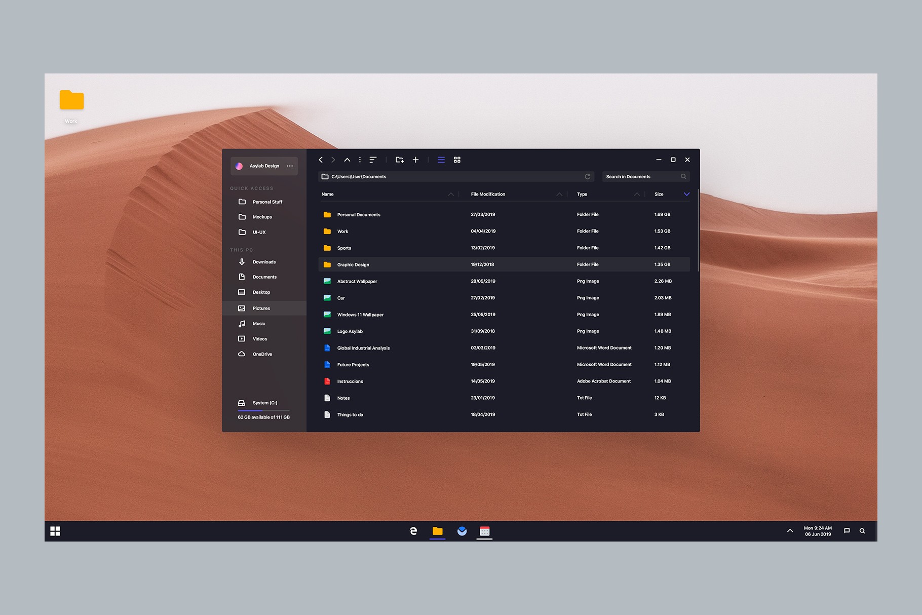 Dark mode Windows 11 concept with a desert background and open file explorer.