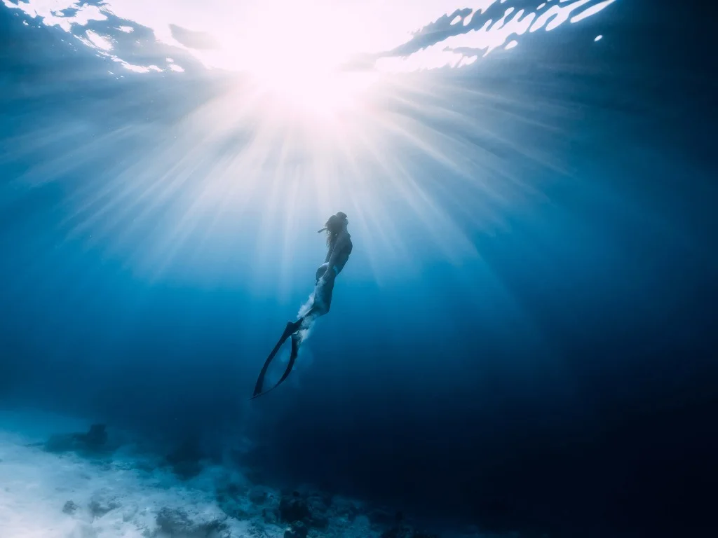 a view of a mountain range with houses in the foreground
