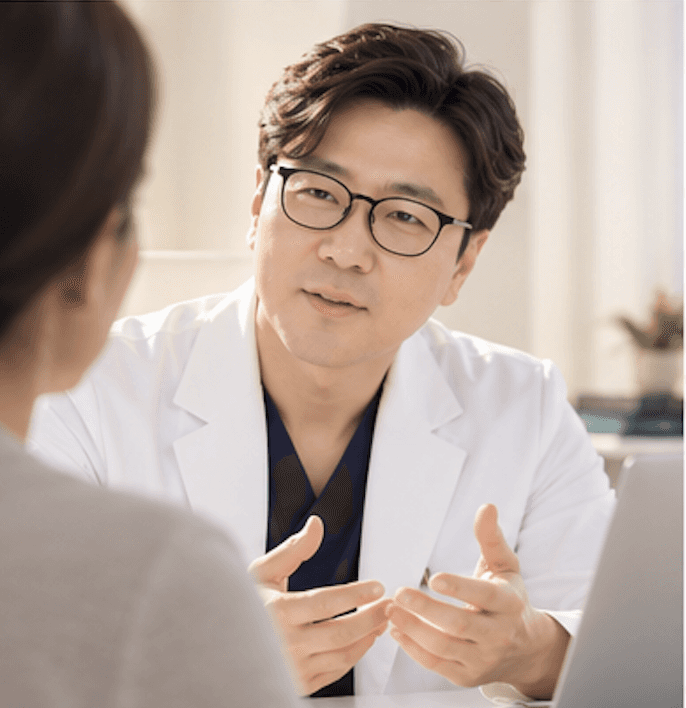 Dr. Yu consulting with a patient