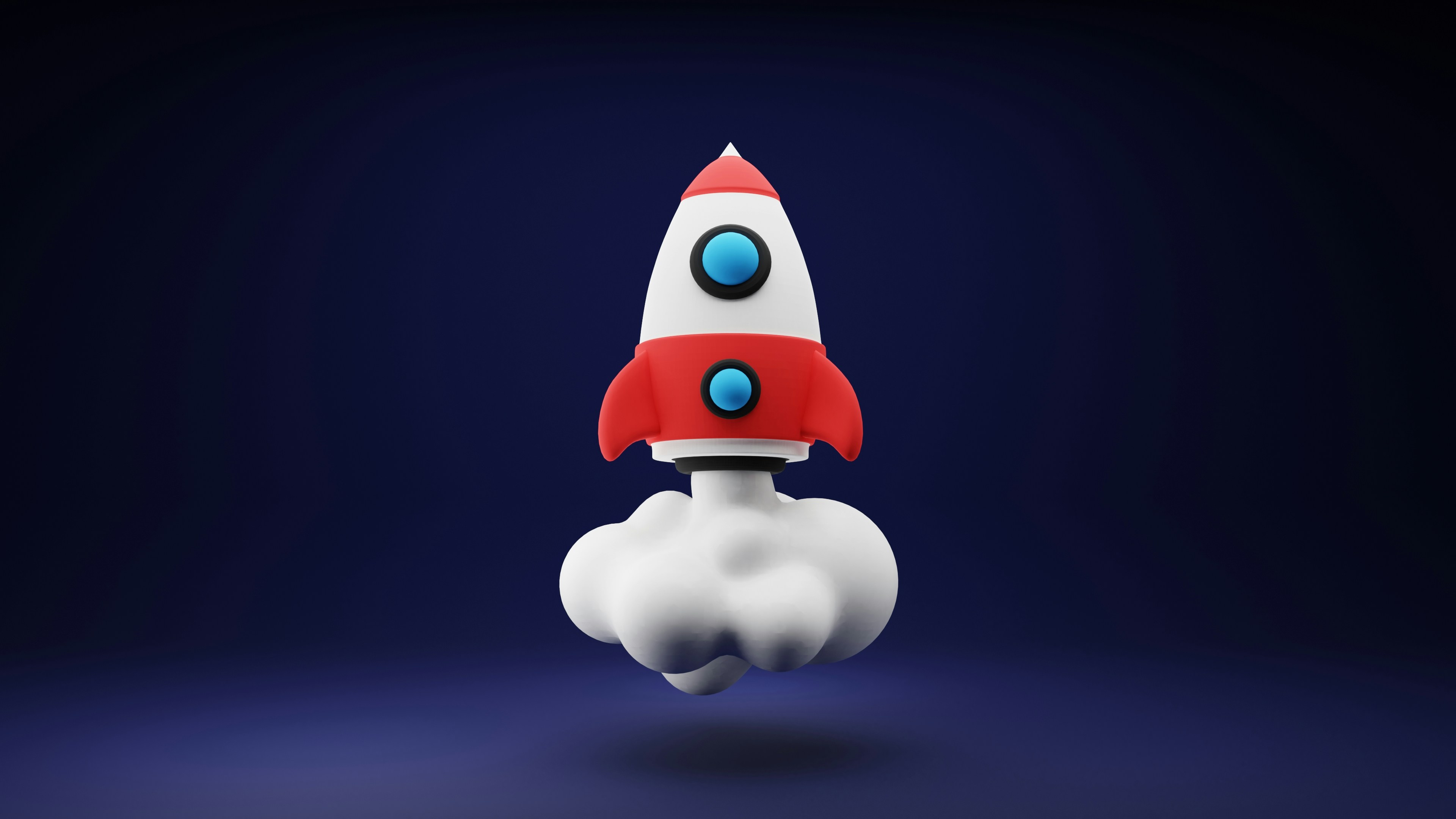 A cartoon-style rocket with a red nose and body, hovering above fluffy clouds against a dark blue background.