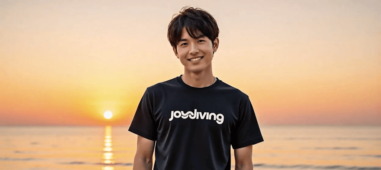 Image of a asian young man in black tee Shirt on a sunset beach background