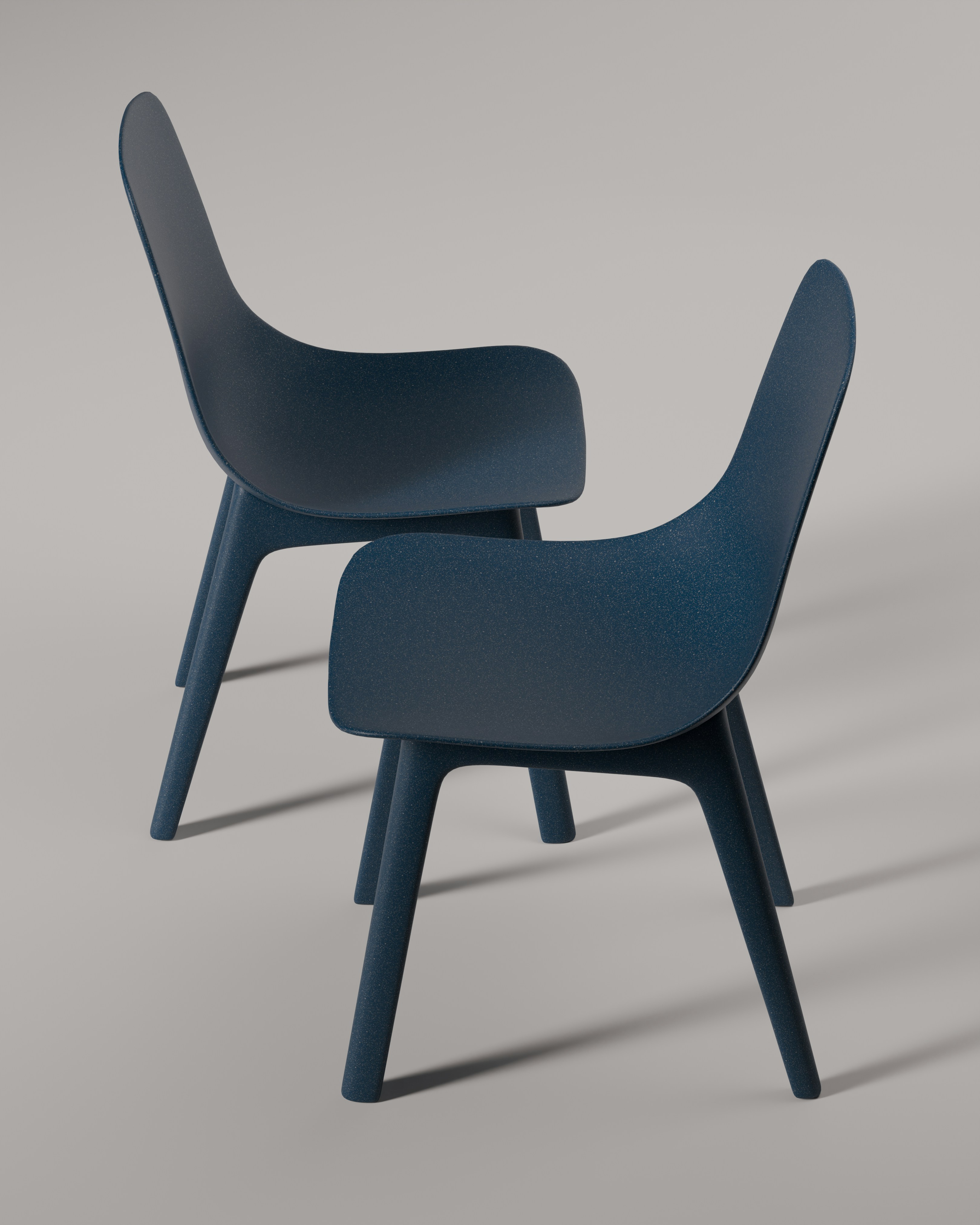 Two modern chairs are displayed in this photograph.