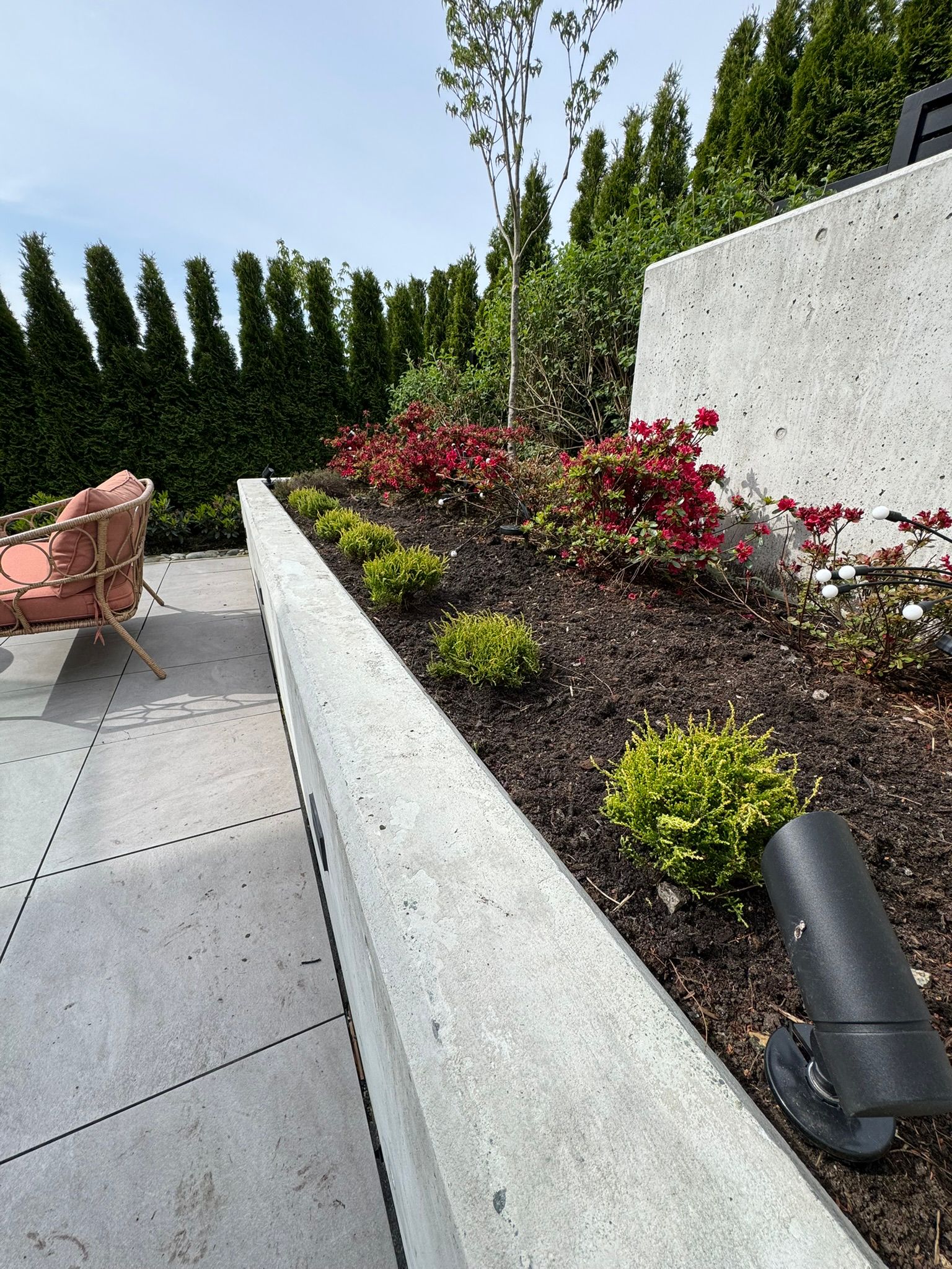 Beautiful landscaped garden with greenery and outdoor design elements.