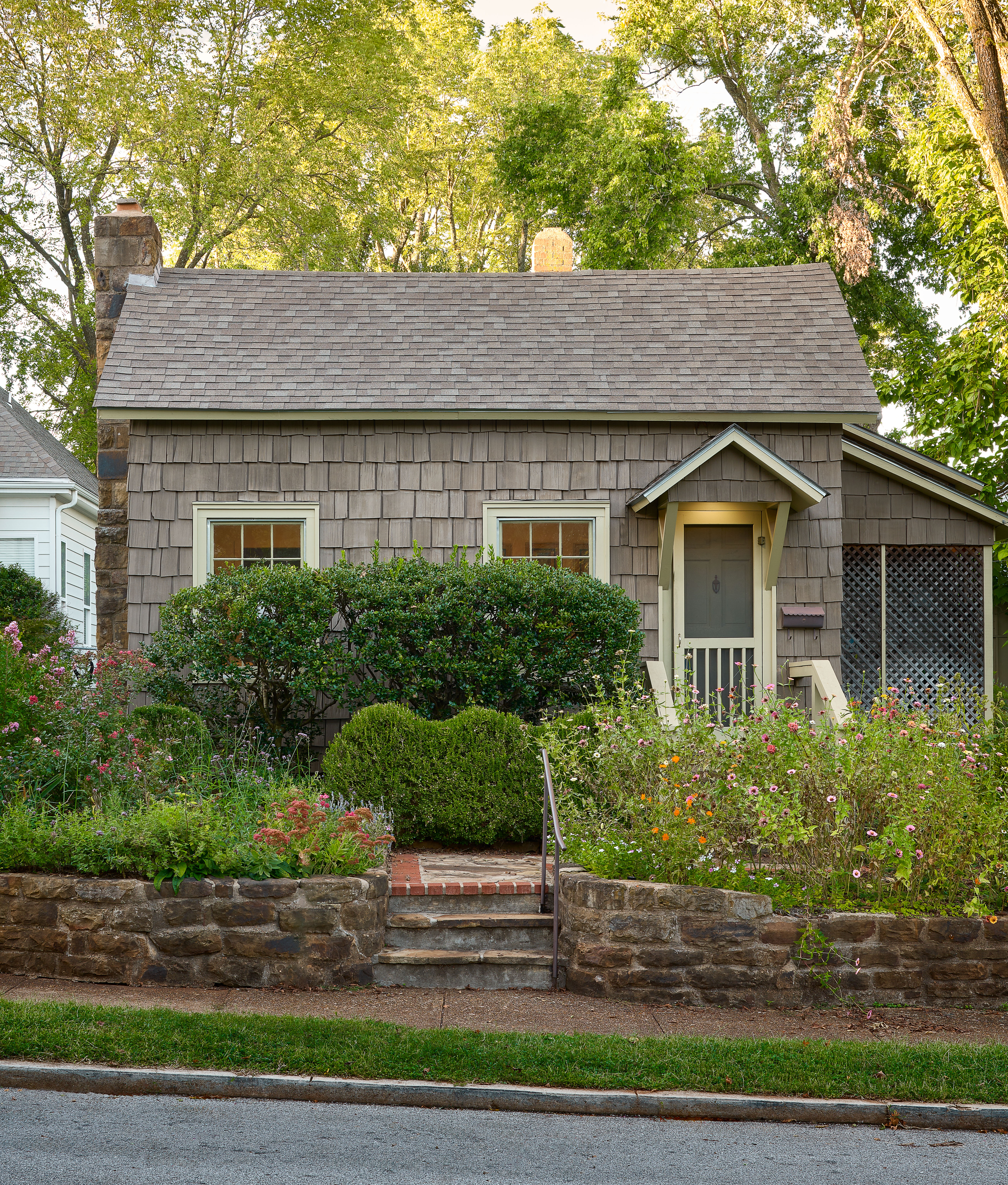 Cottage Exterior with a wavy hedge