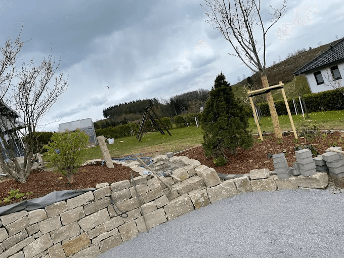 Beautiful landscaped garden with greenery and outdoor design elements.