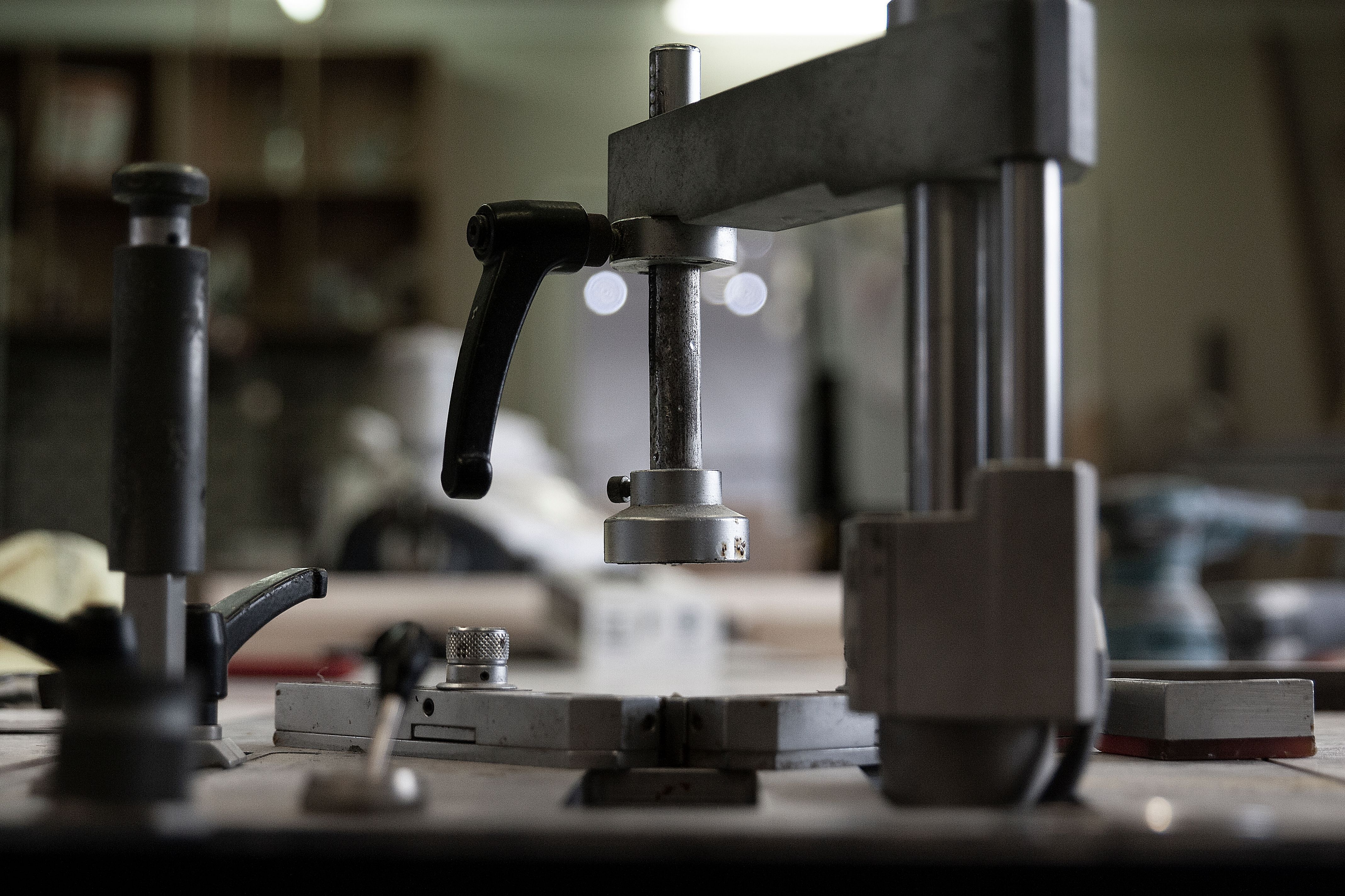 soft-focus-of-weathered-part-of-industrial-machinery-installed-on-workbench-in-p - karen-laårk-boshoff (pexels)