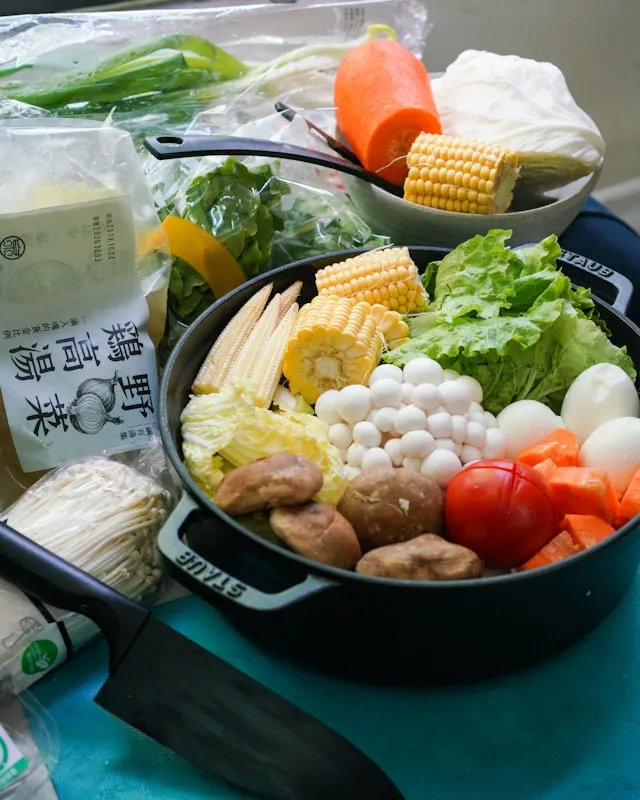 Assorted keto and Atkins-friendly foods including eggs, meat, and low-carb vegetables.