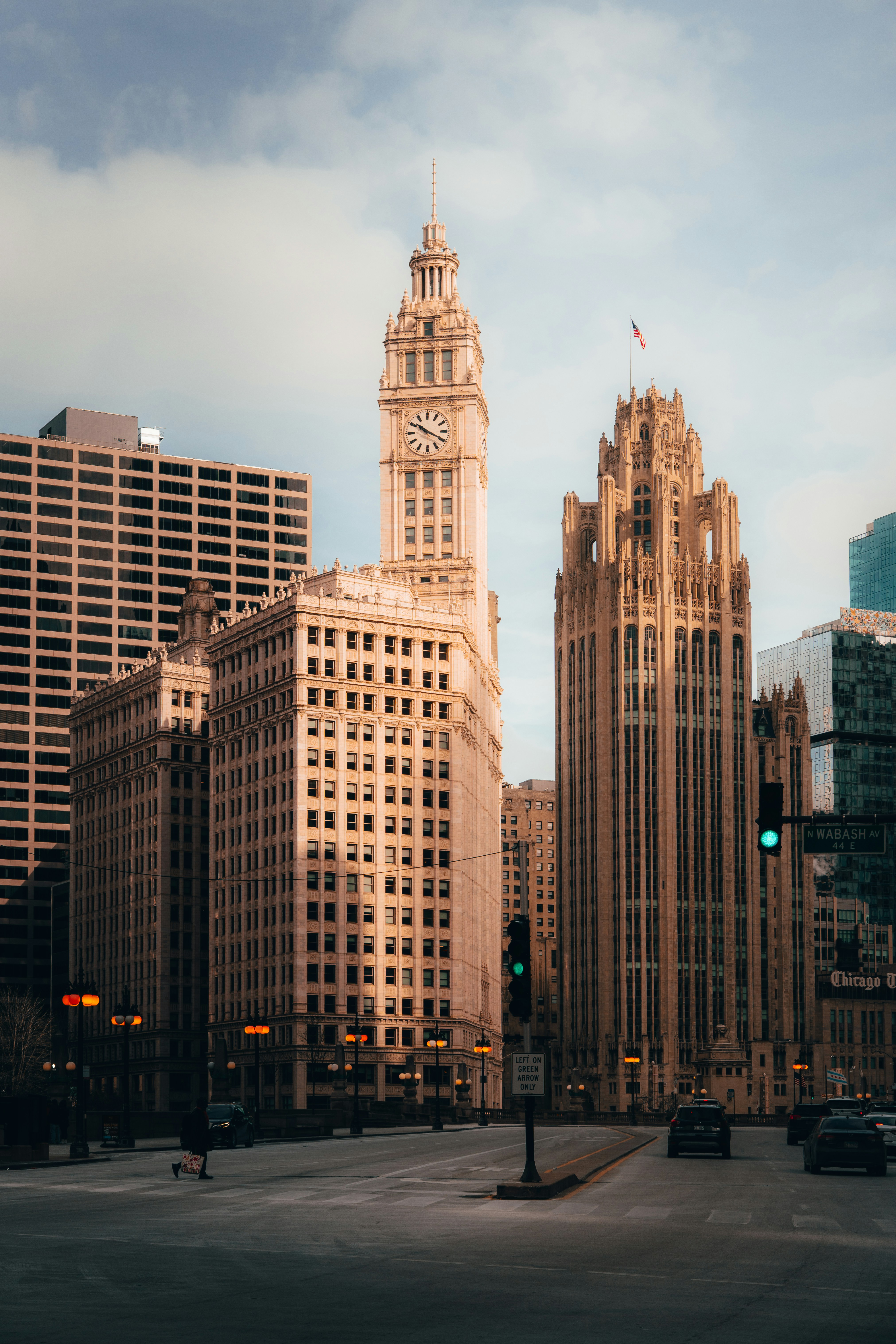 Cityscape features tall buildings and an iconic clock tower.
