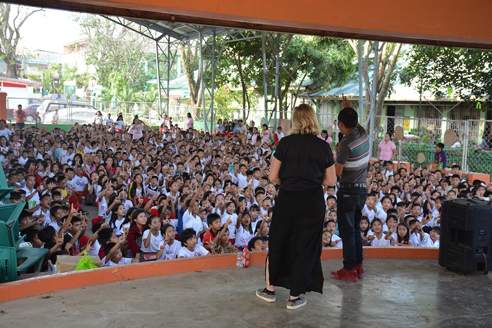 Women preaching to kids