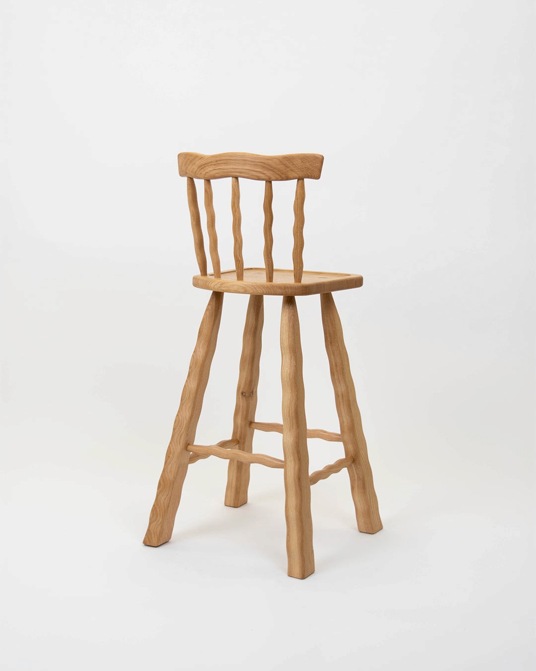 Oak bar stool on a white background