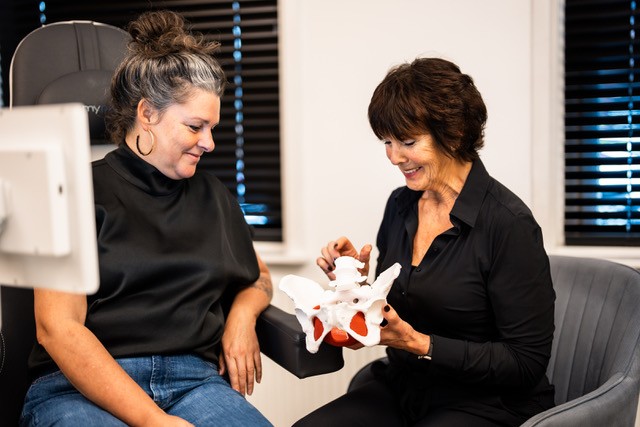 Woman pouring vitamins in her hand
