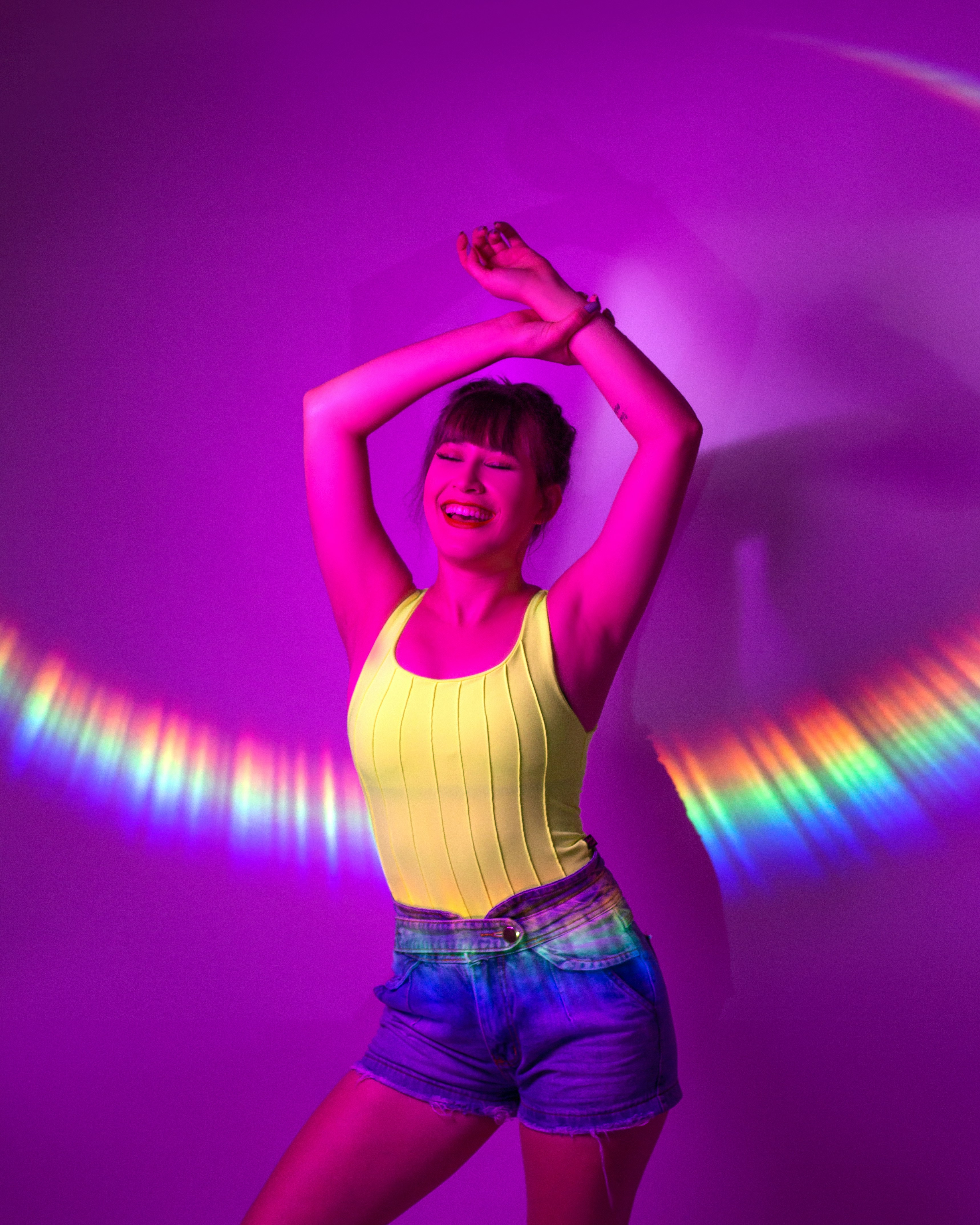 A happy person in neon