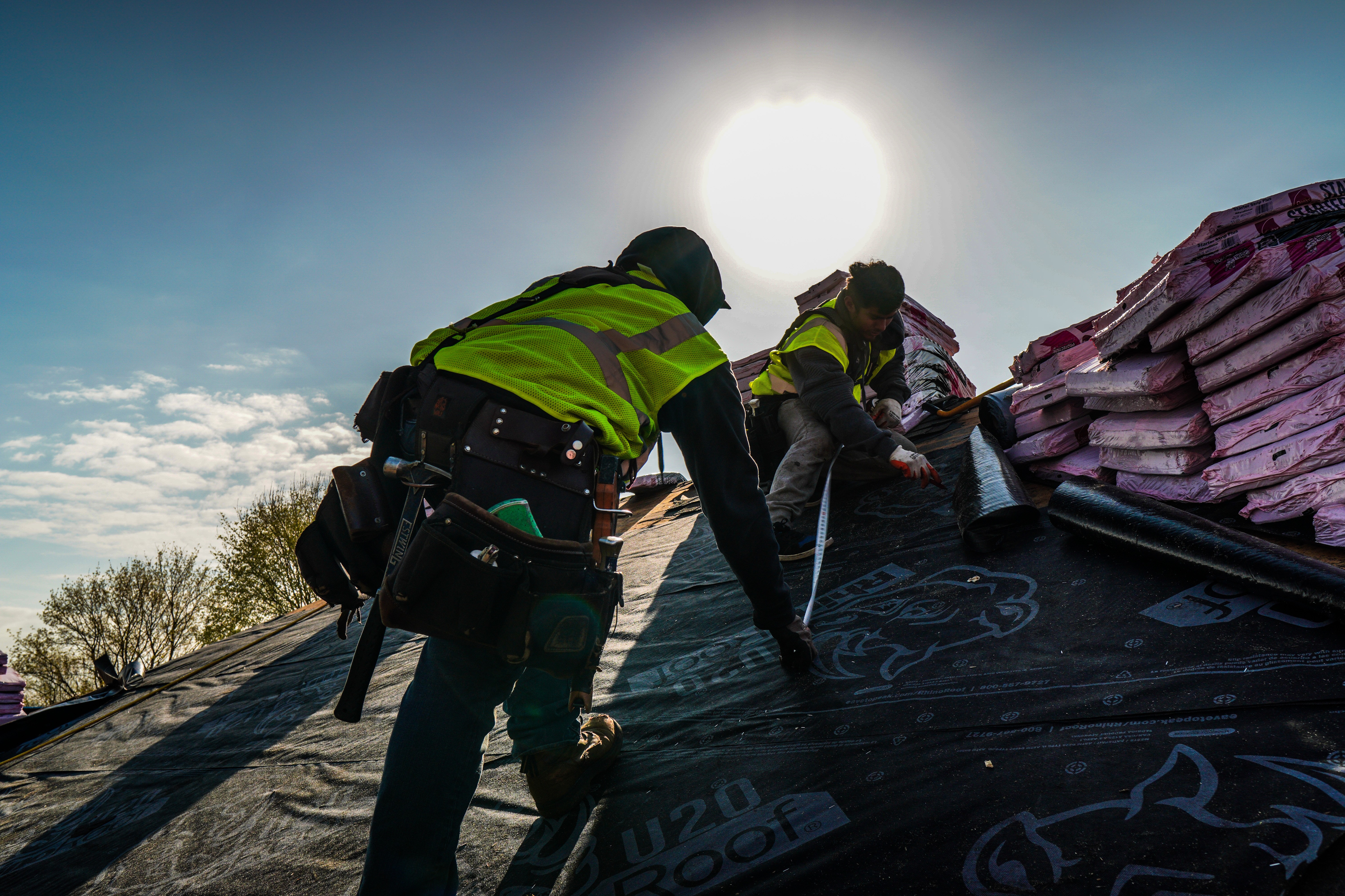 Asbury roofing crew working on a residential roof