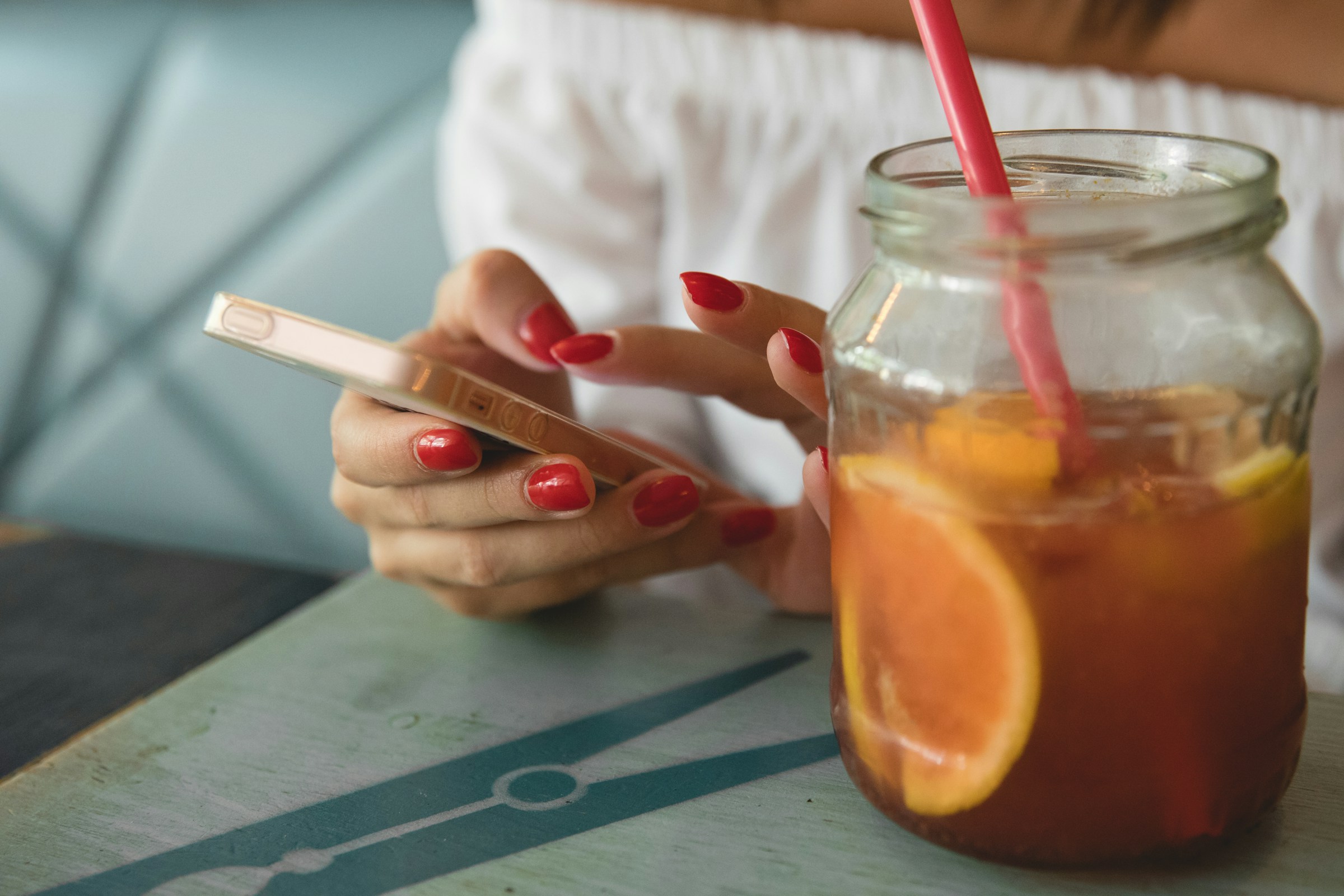 woman with red nails - Preppy Nail Colors